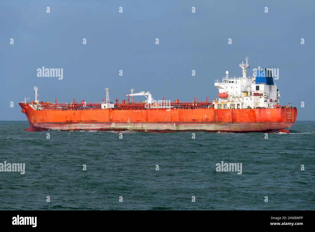 The chemical tanker New Dawn leaves the port of Rotterdam on January 30, 2022. Stock Photo