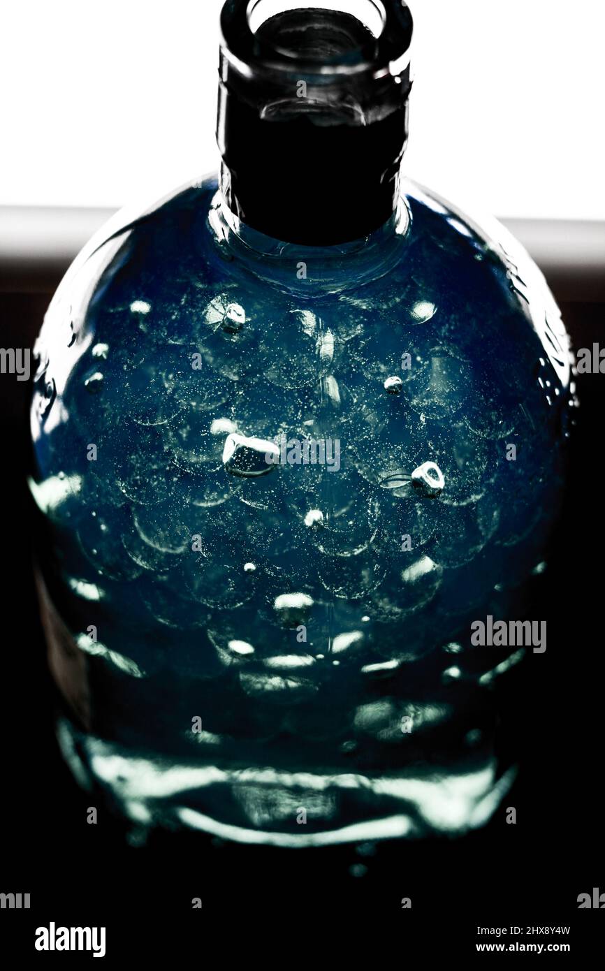 Blue water beads in a jar Stock Photo - Alamy