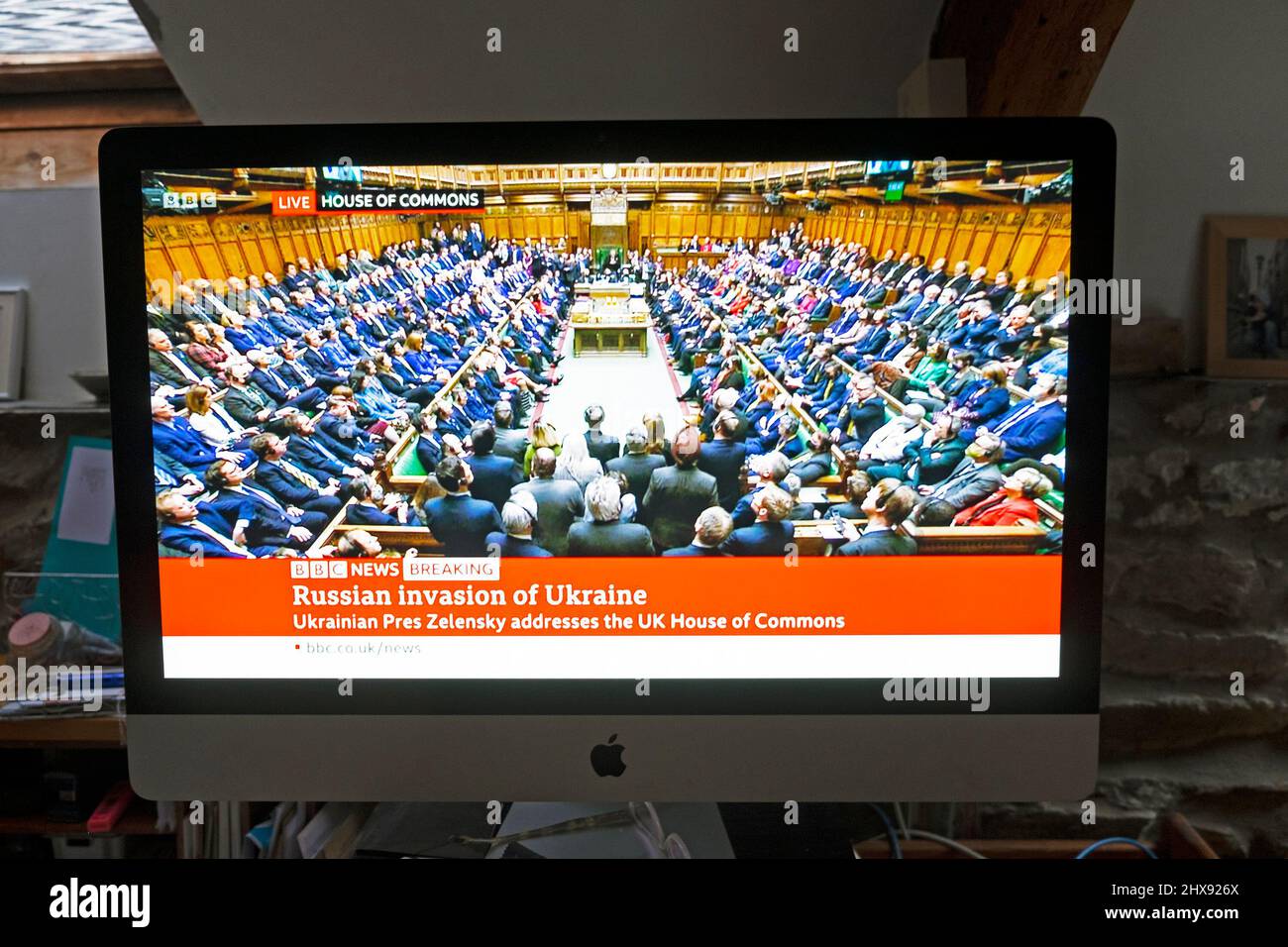 Ukraine President Zelensky speech via video link on computer screen to the House of Commons MPs members in chamber on 8 March 2022 London England UK Stock Photo