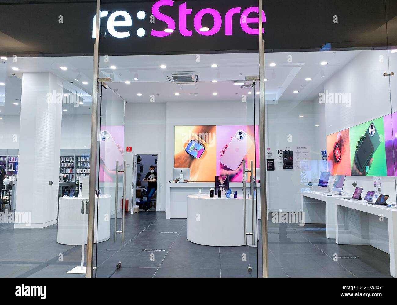 Moscow, Russia, March 2022: Entrance to re: Store - Apple branded hardware stores and service centers in Russia. No buyers, sellers inside. Stock Photo