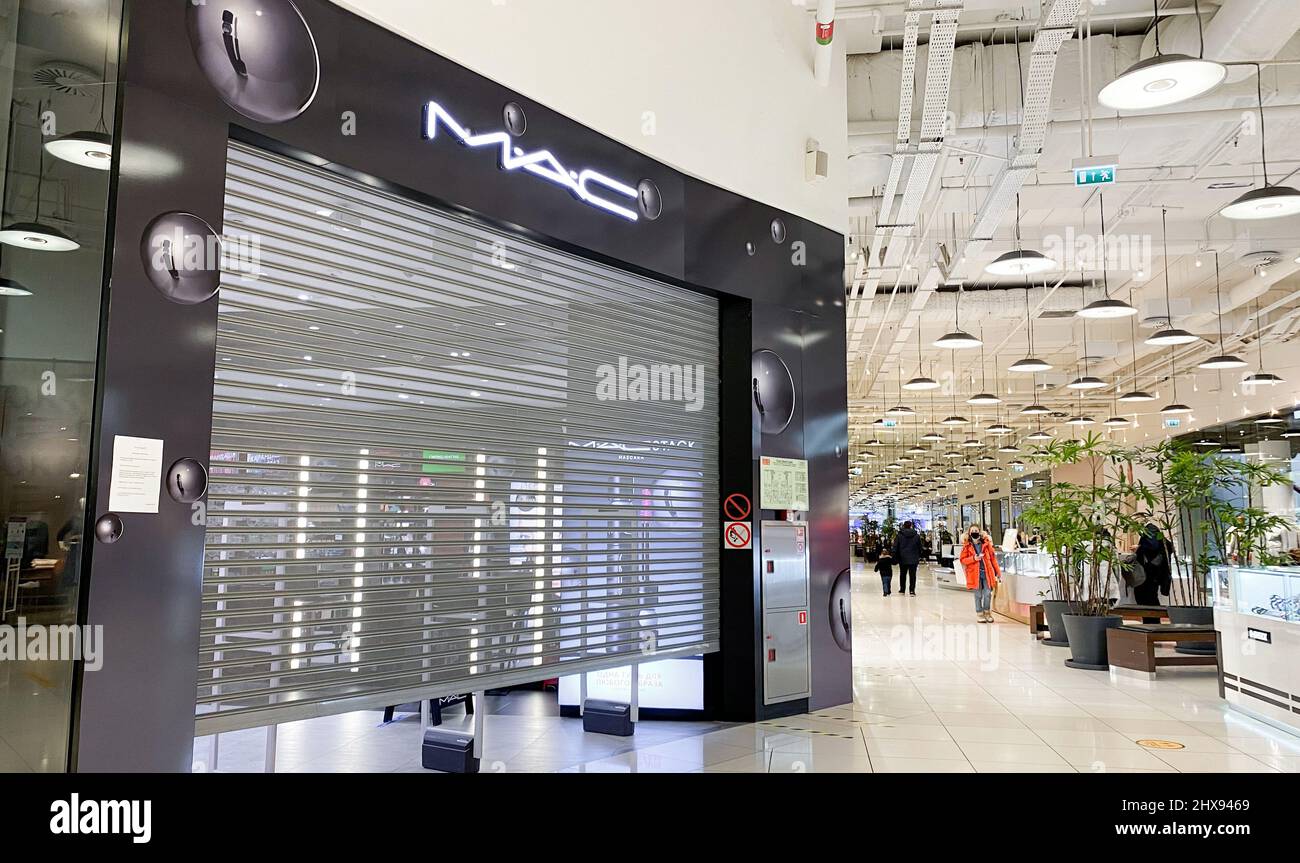 Moscow, Russia, March 2022: M.A.C. Cosmetics store suspends work in Russia. Brand shops in the shopping mall are closed. Customers are passing by. Stock Photo