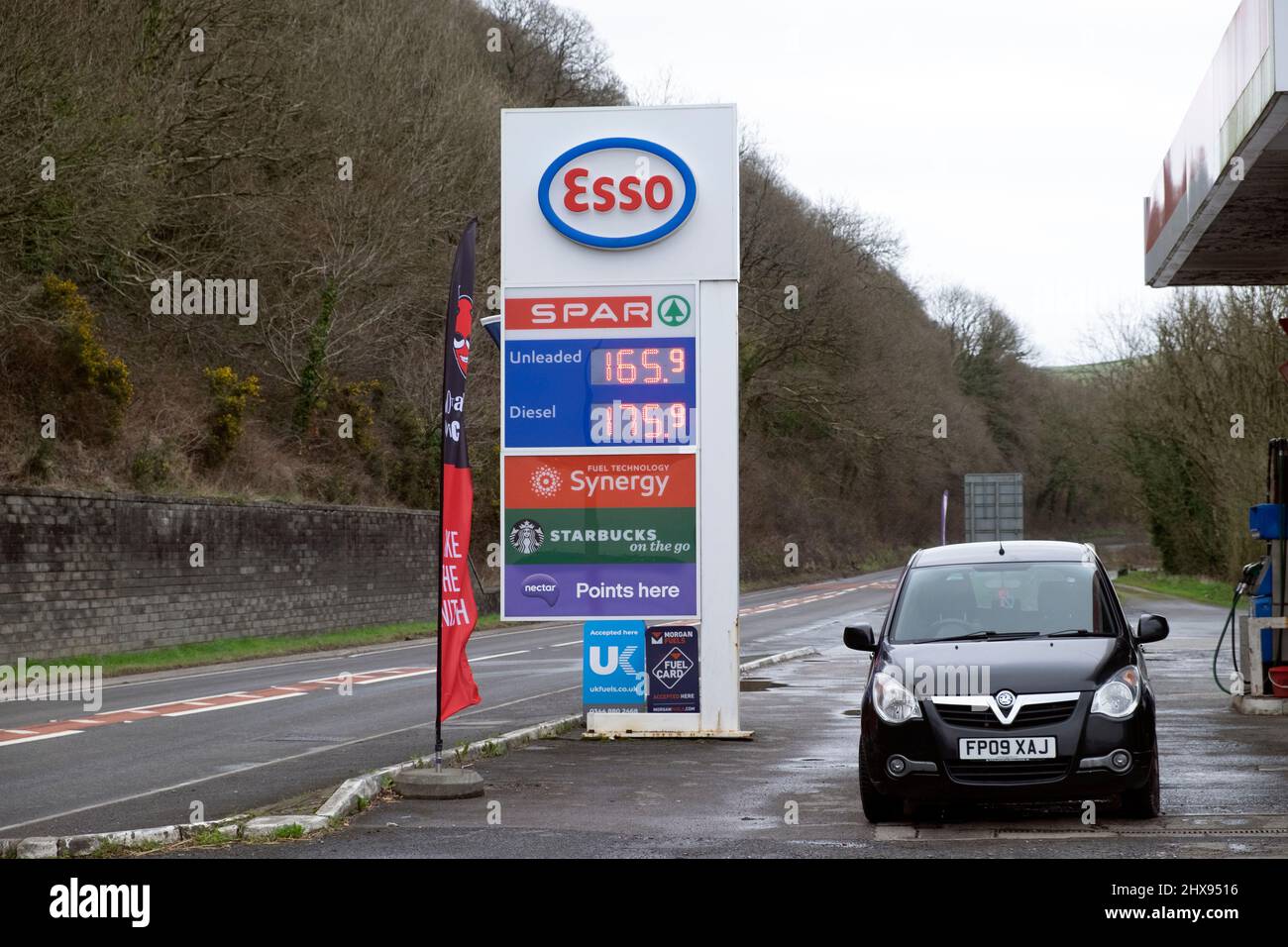 Petrol prices on Esso station sign Unleaded 165.9 per litre diesel 175.9 per litre on 10 March 2022 in Carmarthenshire Wales UK  KATHY DEWITT Stock Photo