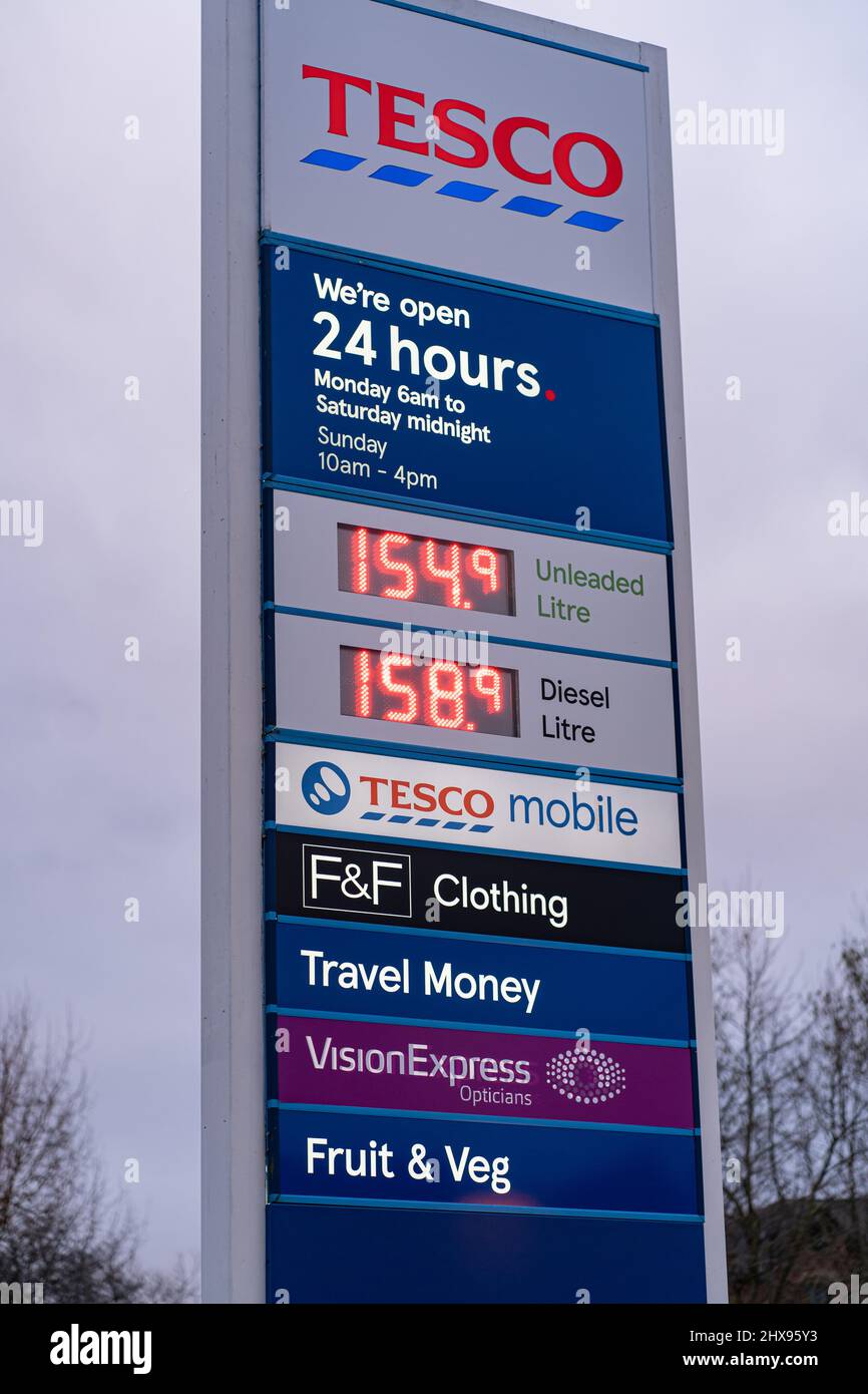 Wigan, UK March 10, 2022 Large illuminated sign at entrance to Tesco