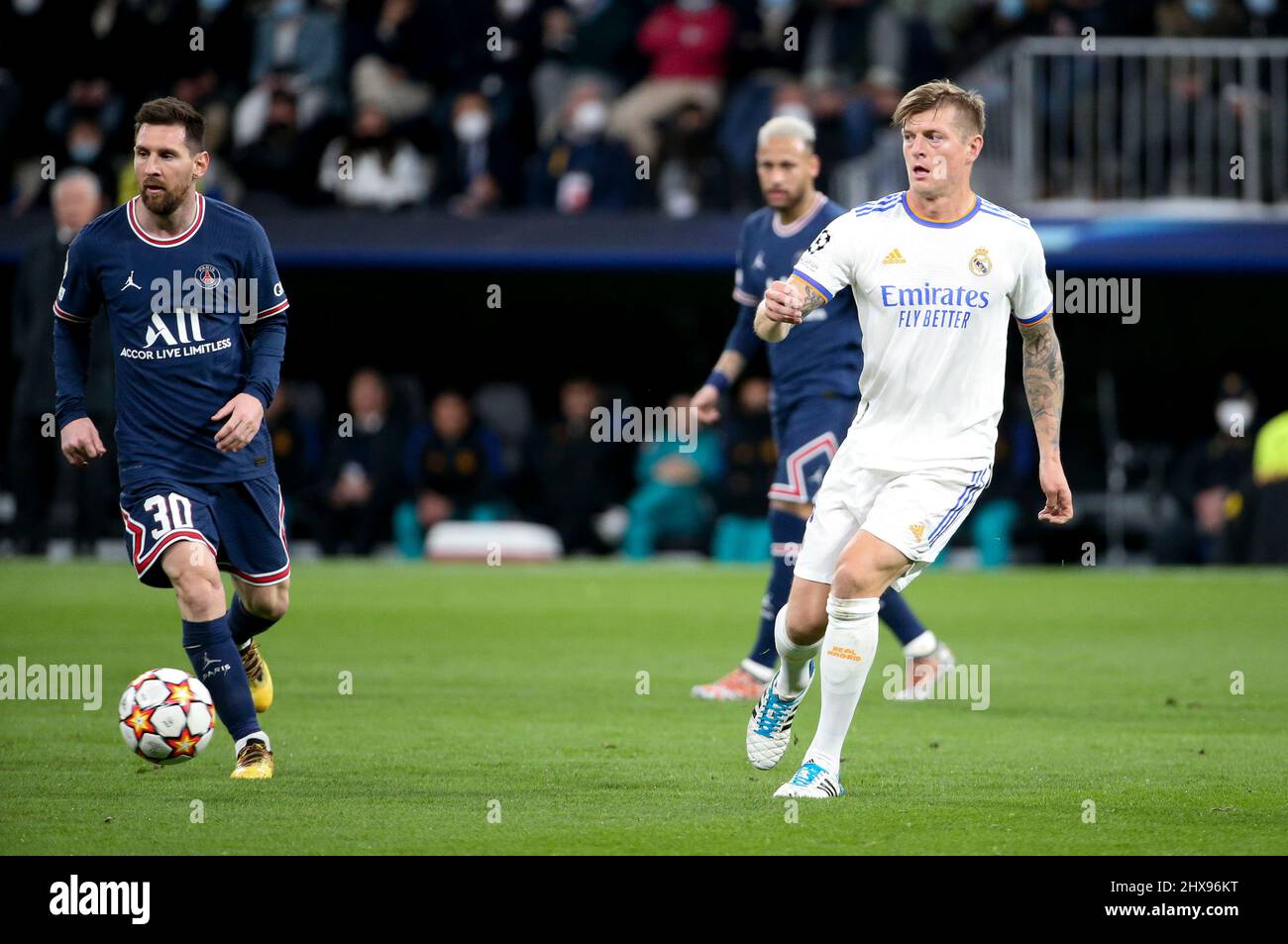 Toni Kroos of Real Madrid, Lionel Messi of PSG (left) during the UEFA Champions League, Round of 16, 2nd leg football match between Real Madrid and Paris Saint-Germain (PSG) on March 9, 2022 at Santiago Bernabeu stadium in Madrid, Spain - Photo Jean Catuffe / DPPI Stock Photo
