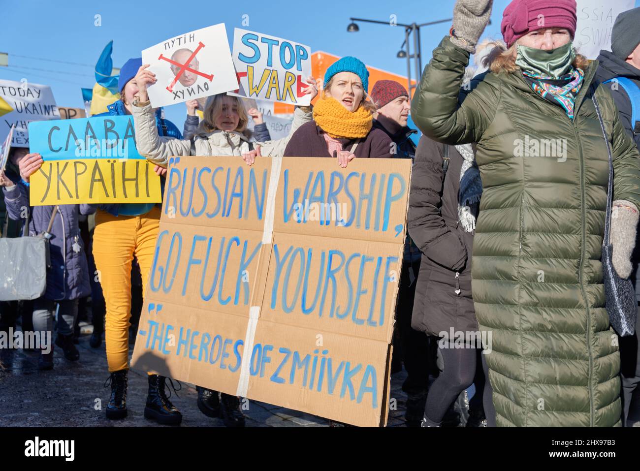 Helsinki; Finland - February 26; 2022: Demonstrators in a rally against Russia’s military aggression and occupation of Ukraine. Stock Photo