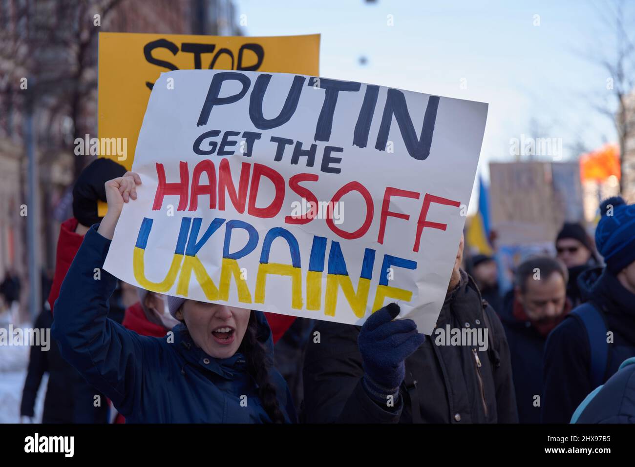 Helsinki, Finland - February 26, 2022: Demonstrator in a rally against Russia’s military aggression and occupation of Ukraine Stock Photo