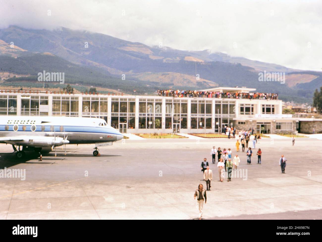 Passengers walking from a terminal at the Quito Airport in Ecquador ...