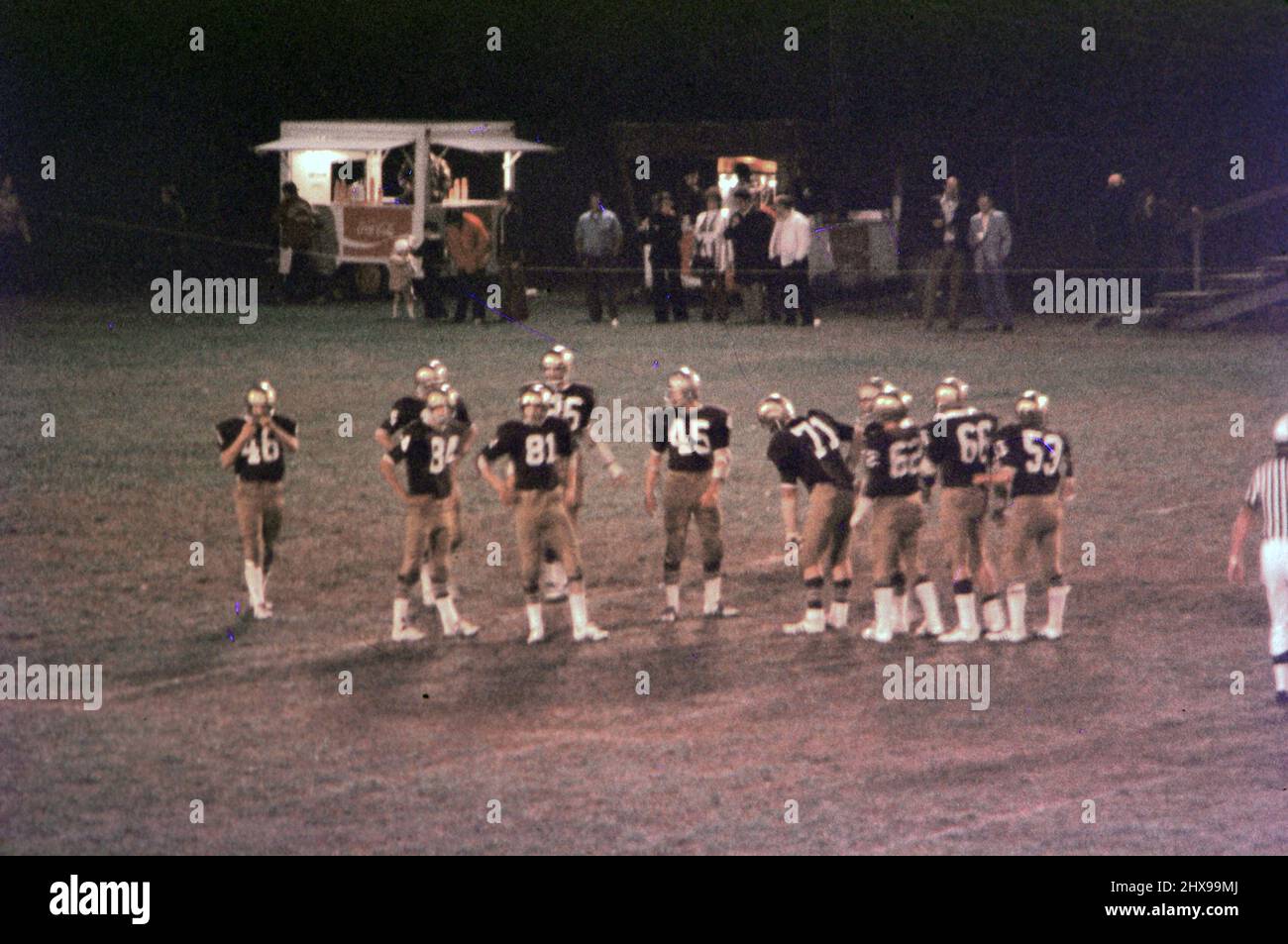 Time out during a high school football game ca. 1974 Stock Photo Alamy