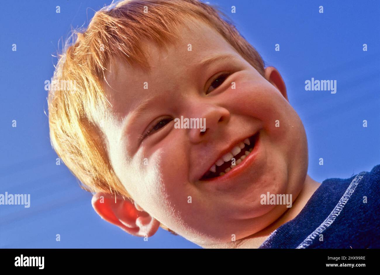 cute happy laughing young boy Stock Photo - Alamy
