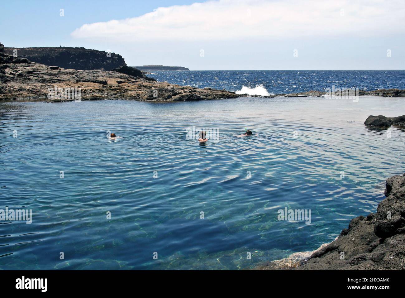 people snorkeling in a natural basin in Lanzarote Stock Photo Alamy