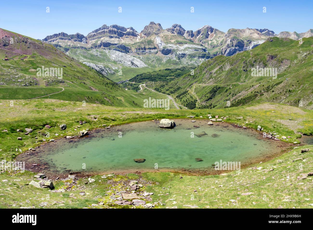 Lakes of Astun hike and views of the valley in Aragon pyrenees mountains in summer in a suuny day Stock Photo