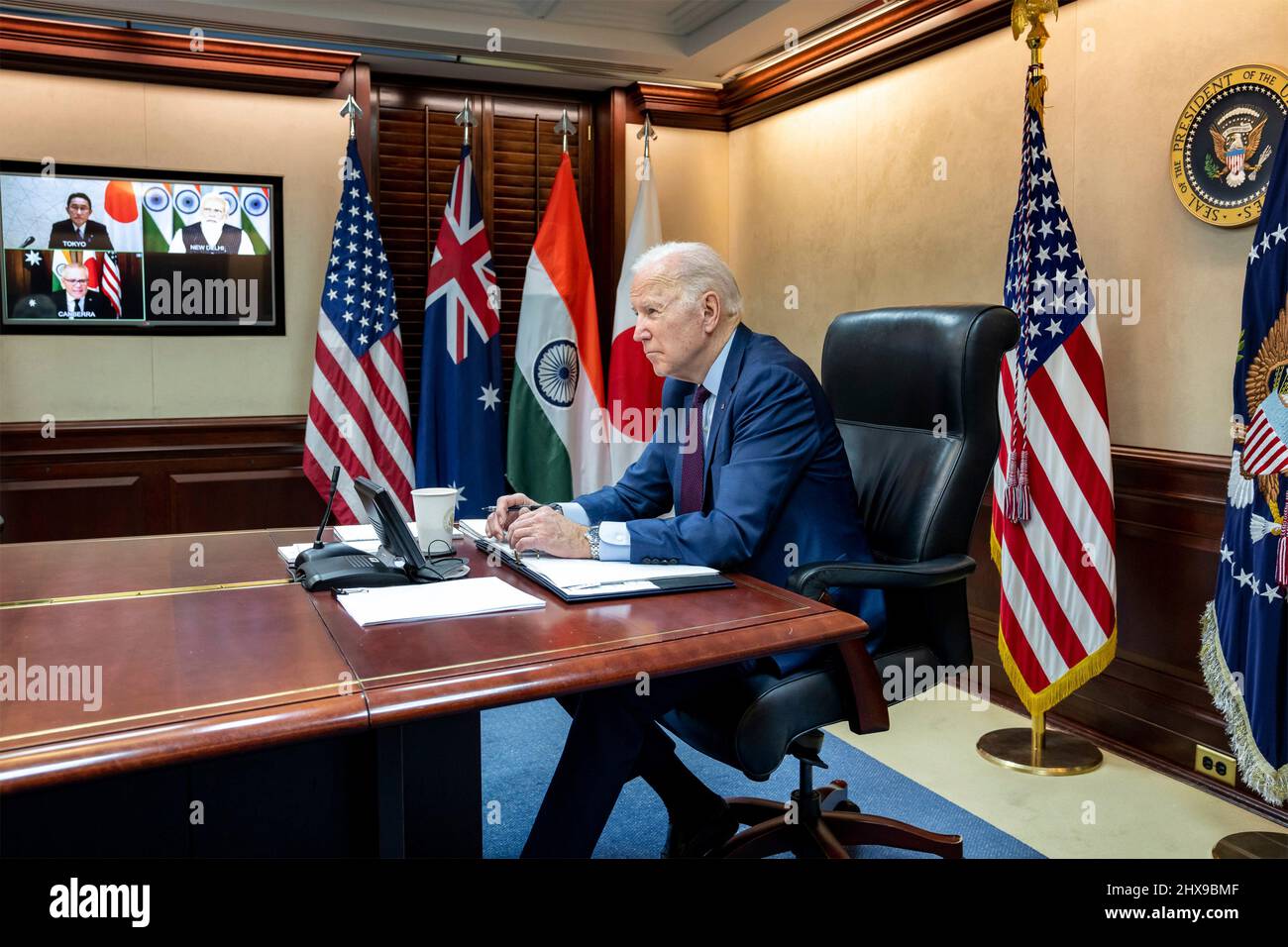Washington, United States of America. 07 March, 2022. U.S President Joe Biden holds a secure conference call with French President Emmanuel Macron, German Chancellor Olaf Scholz, and British Prime Minister Boris Johnson to discuss the ongoing crisis in Ukraine, from the Situation Room of the White House, March 7, 2022 in Washington, D.C.  Credit: Adam Schultz/White House Photo/Alamy Live News Stock Photo