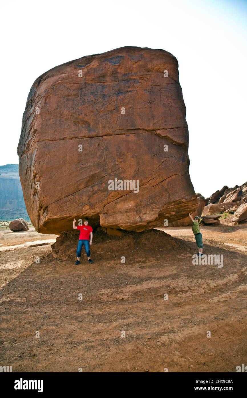Child Carrying Rocks Boy leaning on rock formation hi-res stock photography and images - Alamy