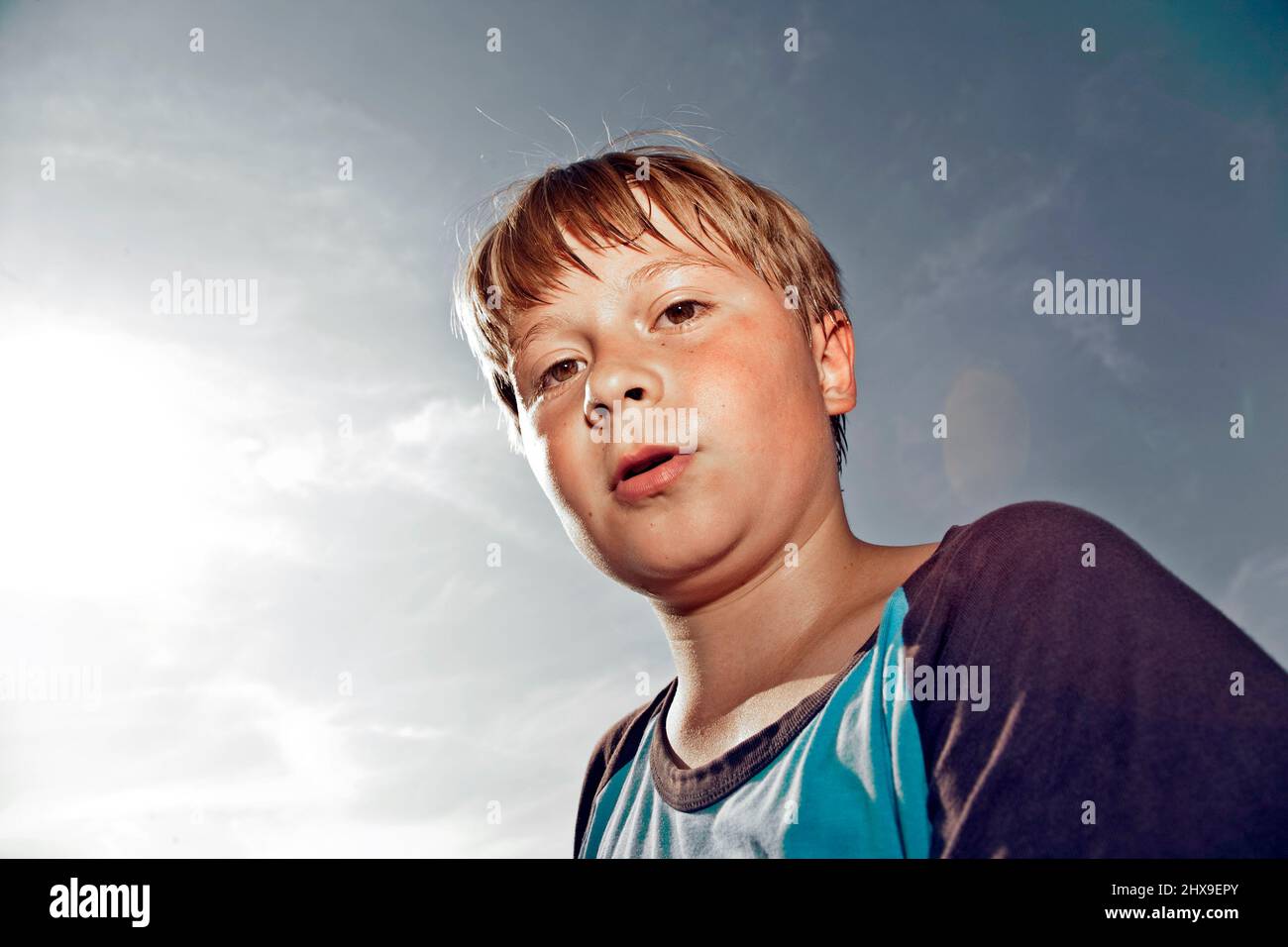 boy with sweating face after sport looks confident Stock Photo Alamy