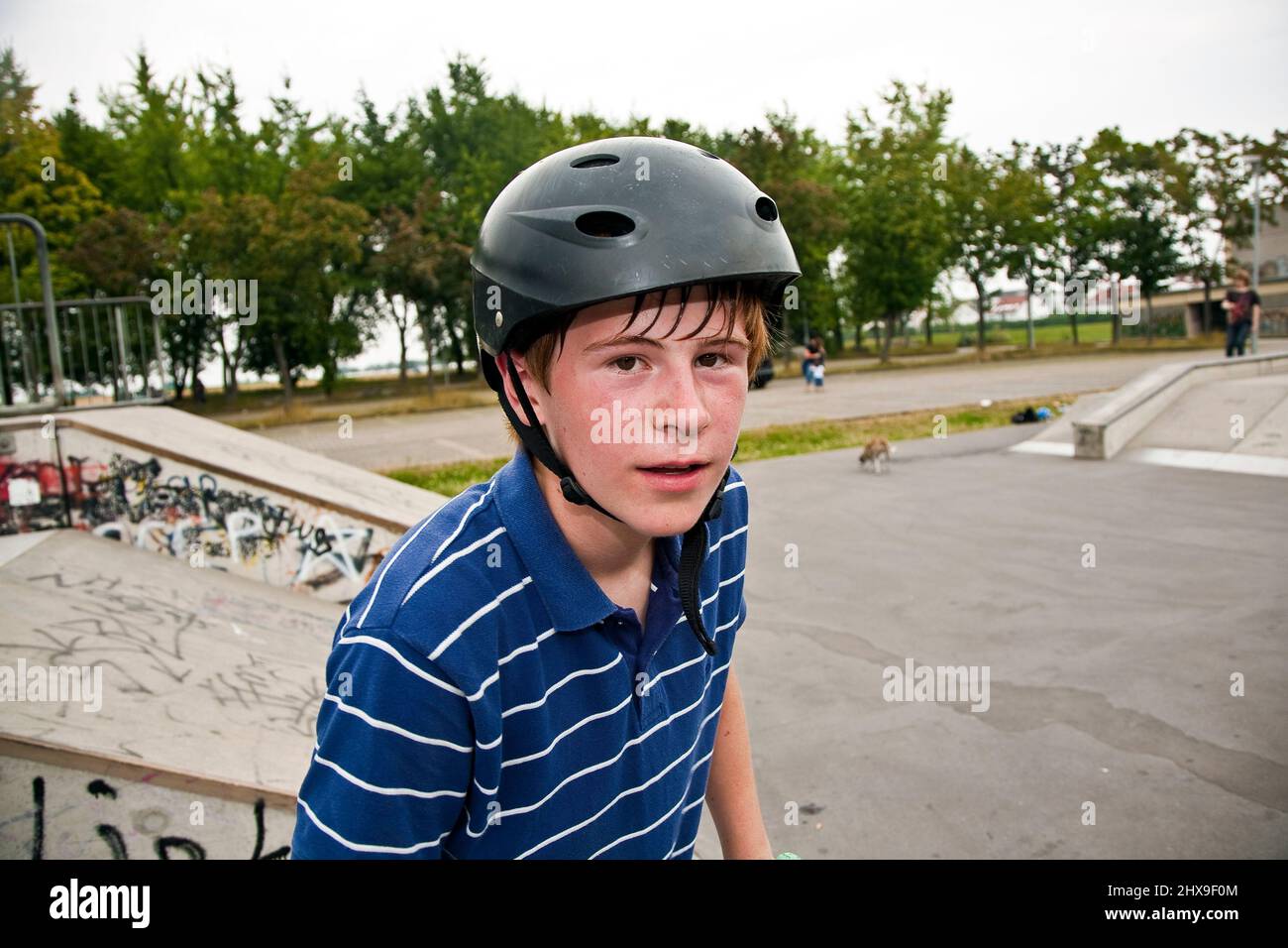 boy with drop of sweat in face from bike and bmx driving Stock Photo