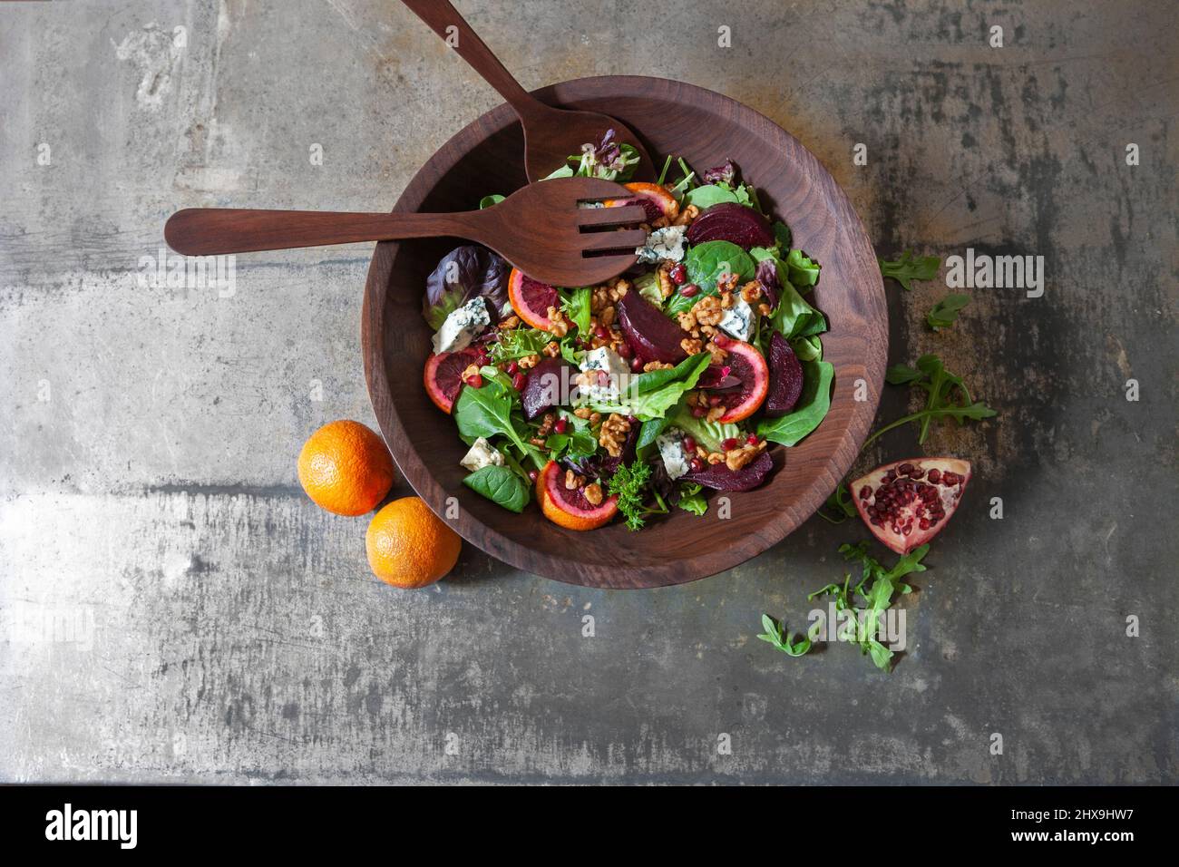 Mixed Green Salad in Wood Bowl Stock Photo