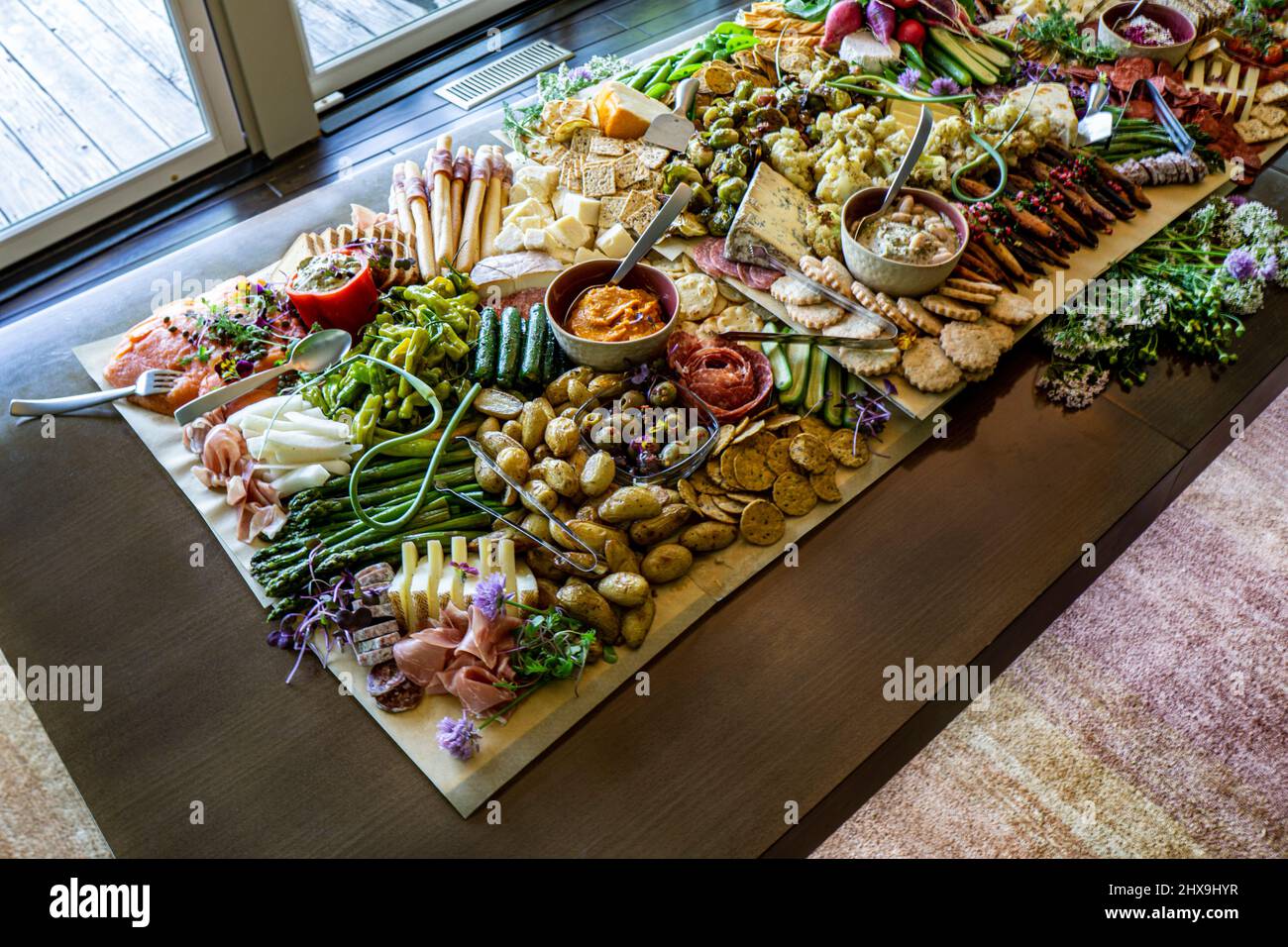 High Angle View of Grazing Board with various Charcuterie, Fruits, Vegetables and Cheese Stock Photo