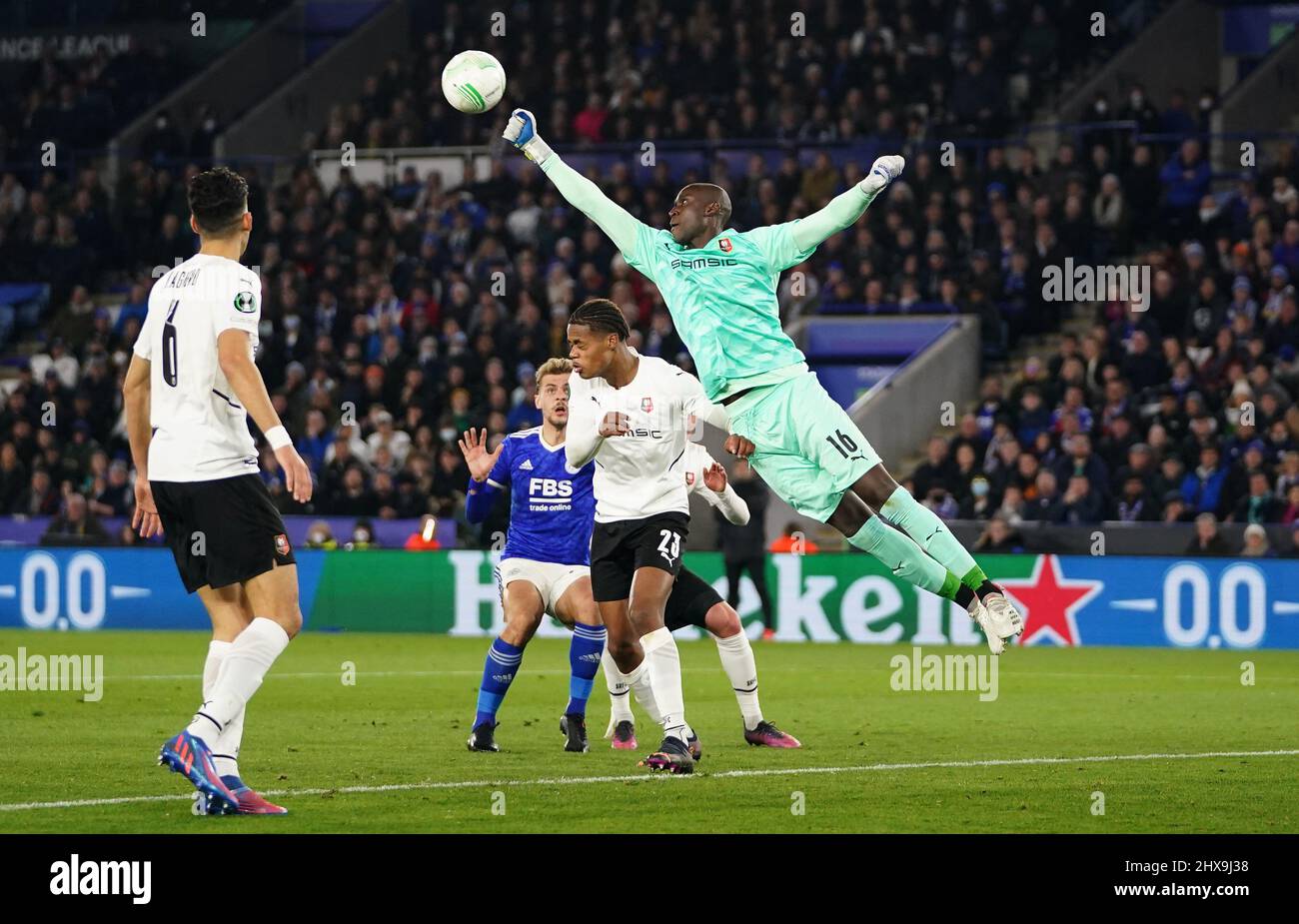 Rennes goalkeeper Alfred Gomis makes a save during the UEFA Europa Conference League round of sixteen first leg match at the King Power Stadium, Leicester. Picture date: Thursday March 10, 2022. Stock Photo