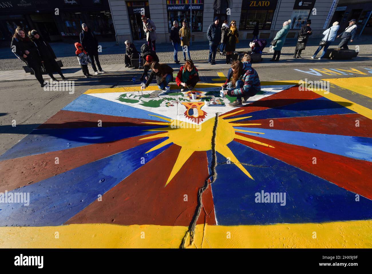 Ostrava, Czech Republic. 10th Mar, 2022. Dozens of people paint Ukrainian and Tibetan flag in the occasion of the annual Festival Flag for Tibet event in support of human rights observance in Tibet in Ostrava, Czech Republic, March 10, 2022. Credit: Jaroslav Ozana/CTK Photo/Alamy Live News Stock Photo