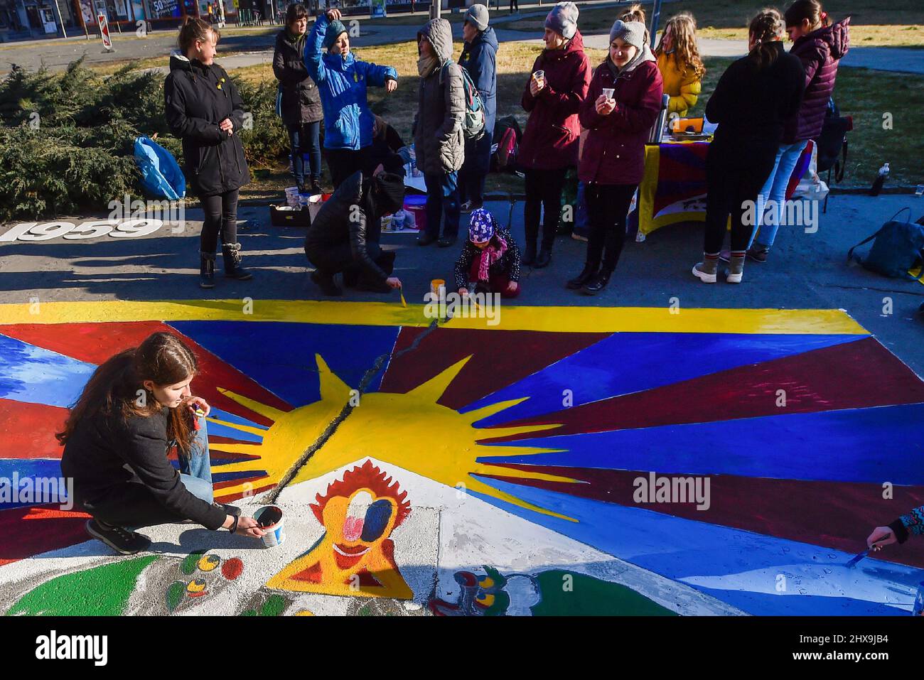 Ostrava, Czech Republic. 10th Mar, 2022. Dozens of people paint Ukrainian and Tibetan flag in the occasion of the annual Festival Flag for Tibet event in support of human rights observance in Tibet in Ostrava, Czech Republic, March 10, 2022. Credit: Jaroslav Ozana/CTK Photo/Alamy Live News Stock Photo