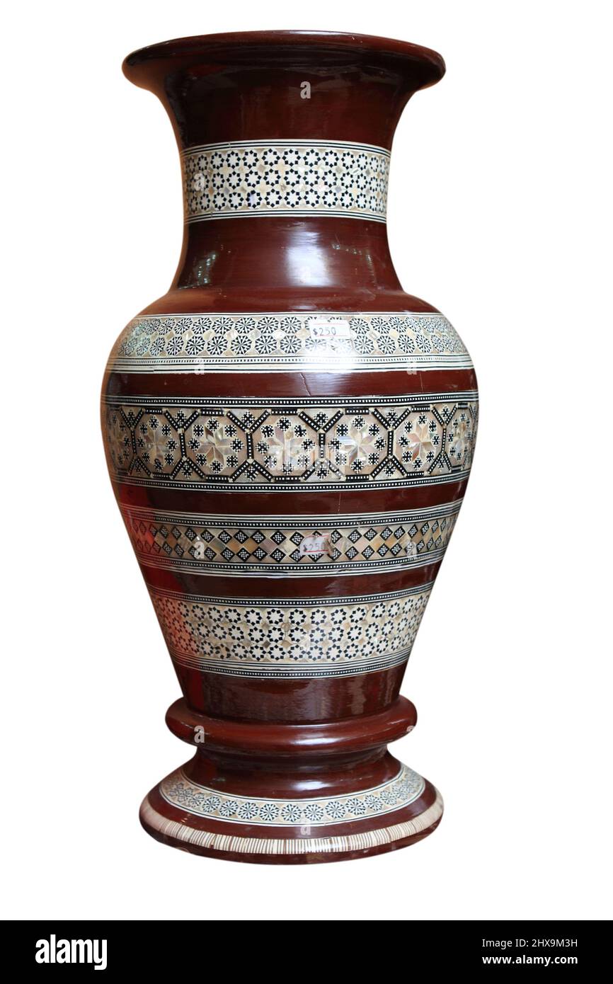 The ancient vase isolated on white background Stock Photo - Alamy