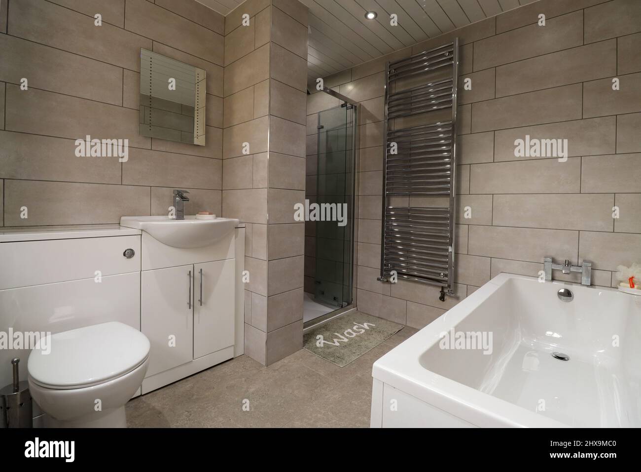 Ultra modern high end bathroom with grey tiles Stock Photo