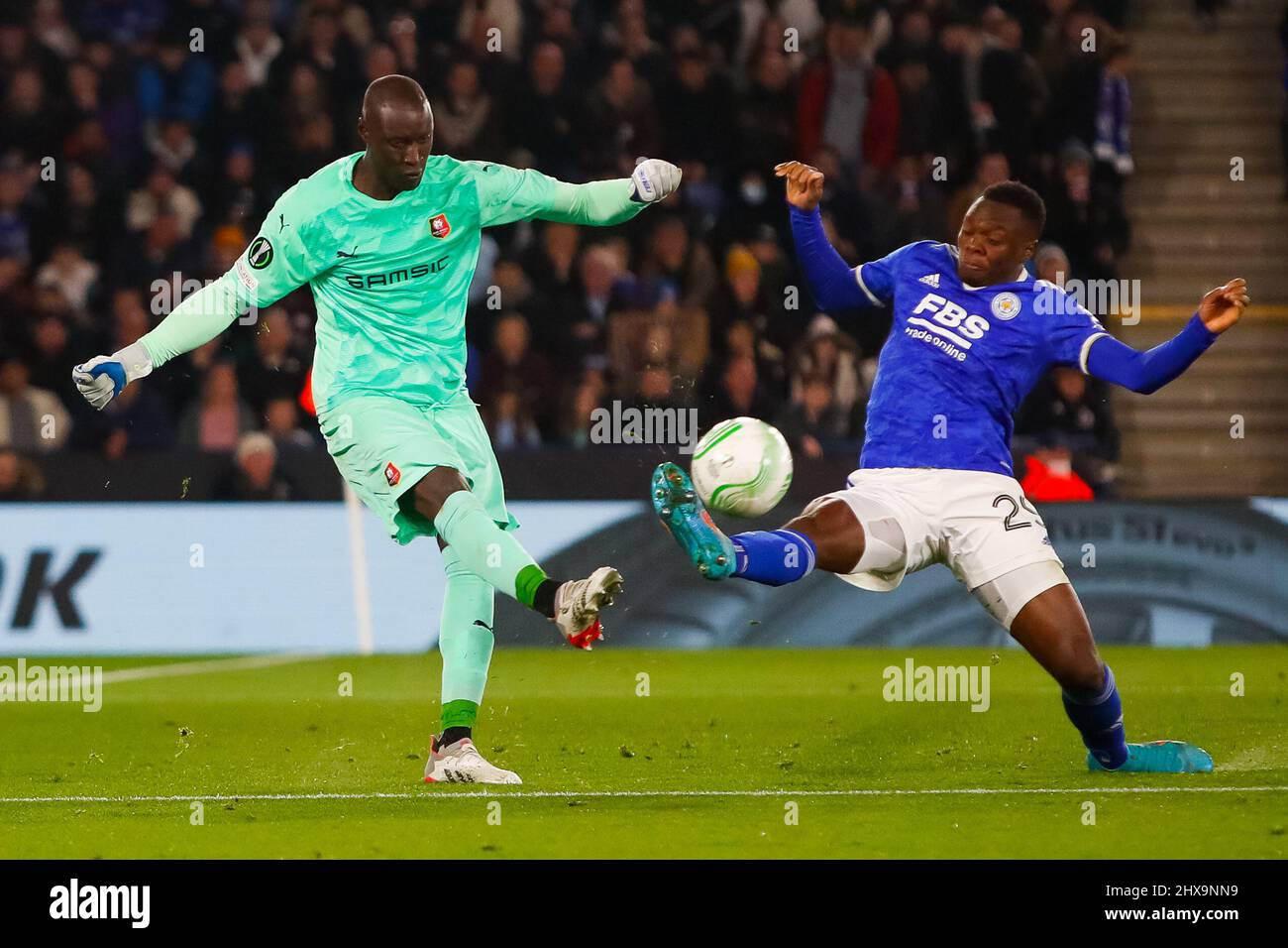 Leicester, UK. 10th Mar, 2022. 10th March 2022; The King Power Stadium, Leicester, Leicestershire, England; Europa Conference League Football, Leicester City versus Rennes; Patson Daka of Leicester City challenges Alfred Gomis of Rennes Credit: Action Plus Sports Images/Alamy Live News Stock Photo