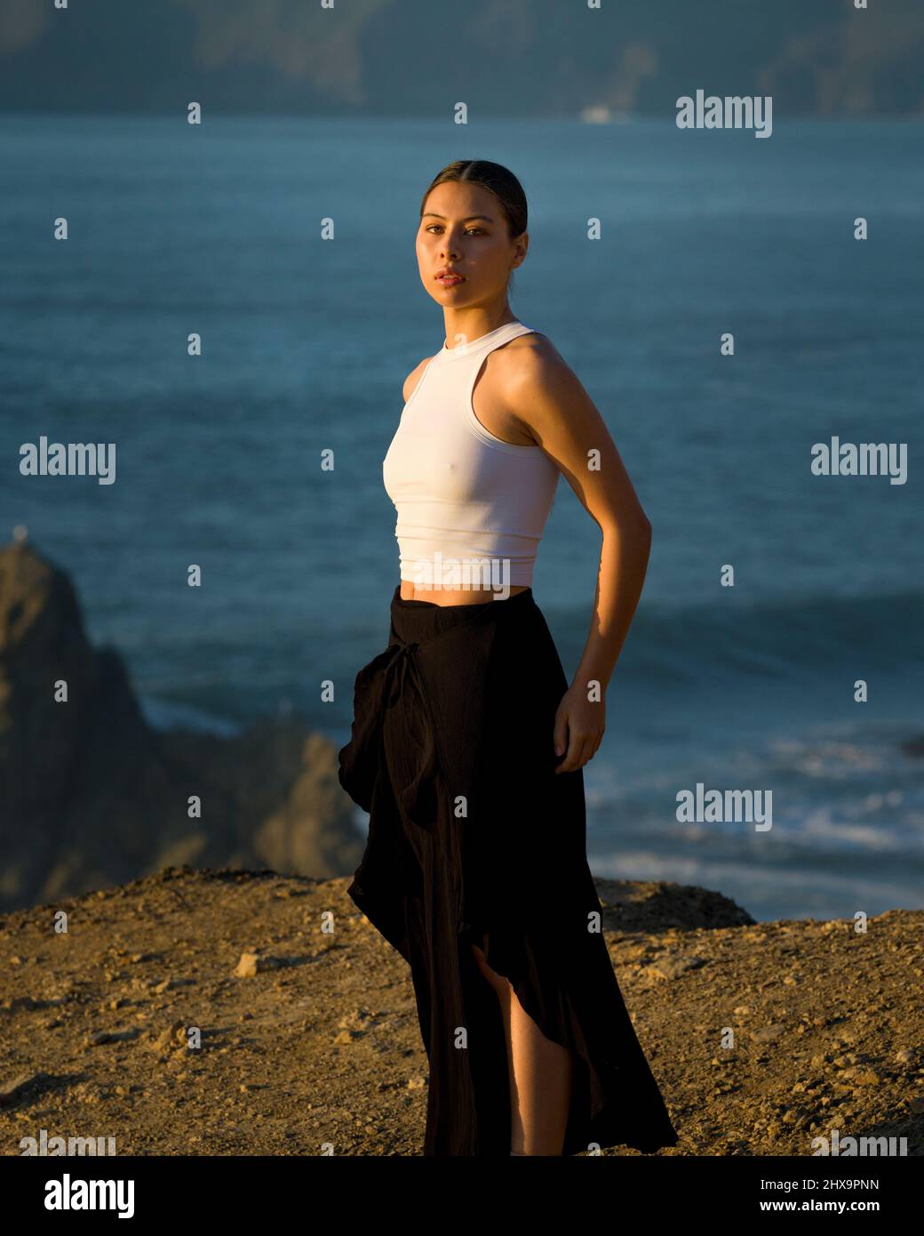 Authentic Multiracial Female Dancer on Cliff Overlooking San Francisco Bay Stock Photo