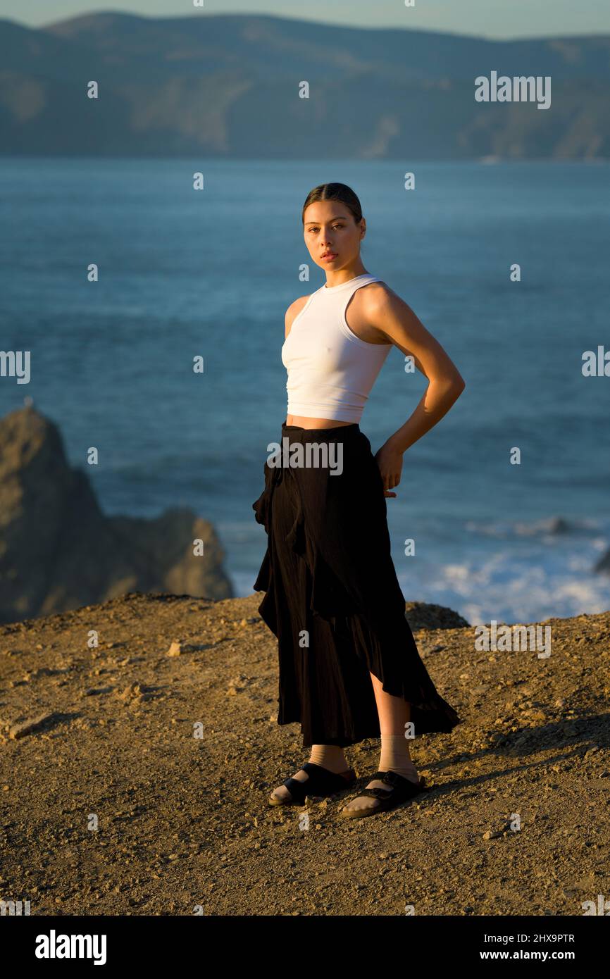 Authentic Multiracial Female Dancer on Cliff Overlooking San Francisco Bay Stock Photo