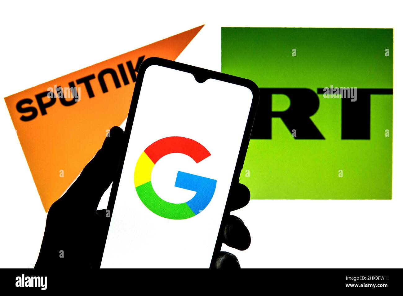 Spain. 09th Mar, 2022. In this photo illustration a Google logo seen displayed on a smartphone with a Sputnik logo and RT logo in the background. (Photo by Thiago Prudencio/SOPA Images/Sipa USA) Credit: Sipa USA/Alamy Live News Stock Photo