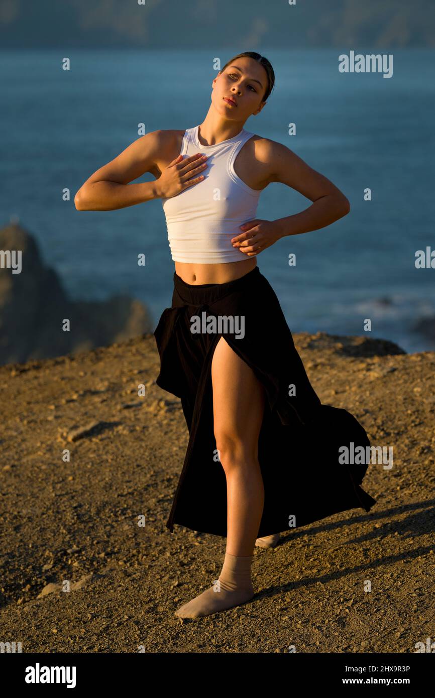 Authentic Multiracial Female Dancer on Cliff Overlooking San Francisco Bay Stock Photo