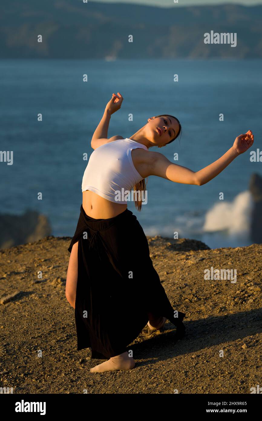 Authentic Multiracial Female Dancer on Cliff Overlooking San Francisco Bay Stock Photo