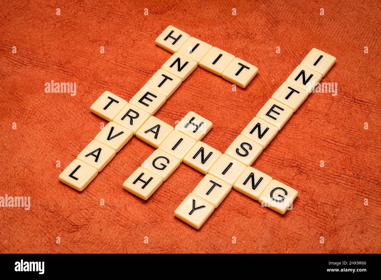 high intensity interval training, HIIT, crossword in ivory letter tiles