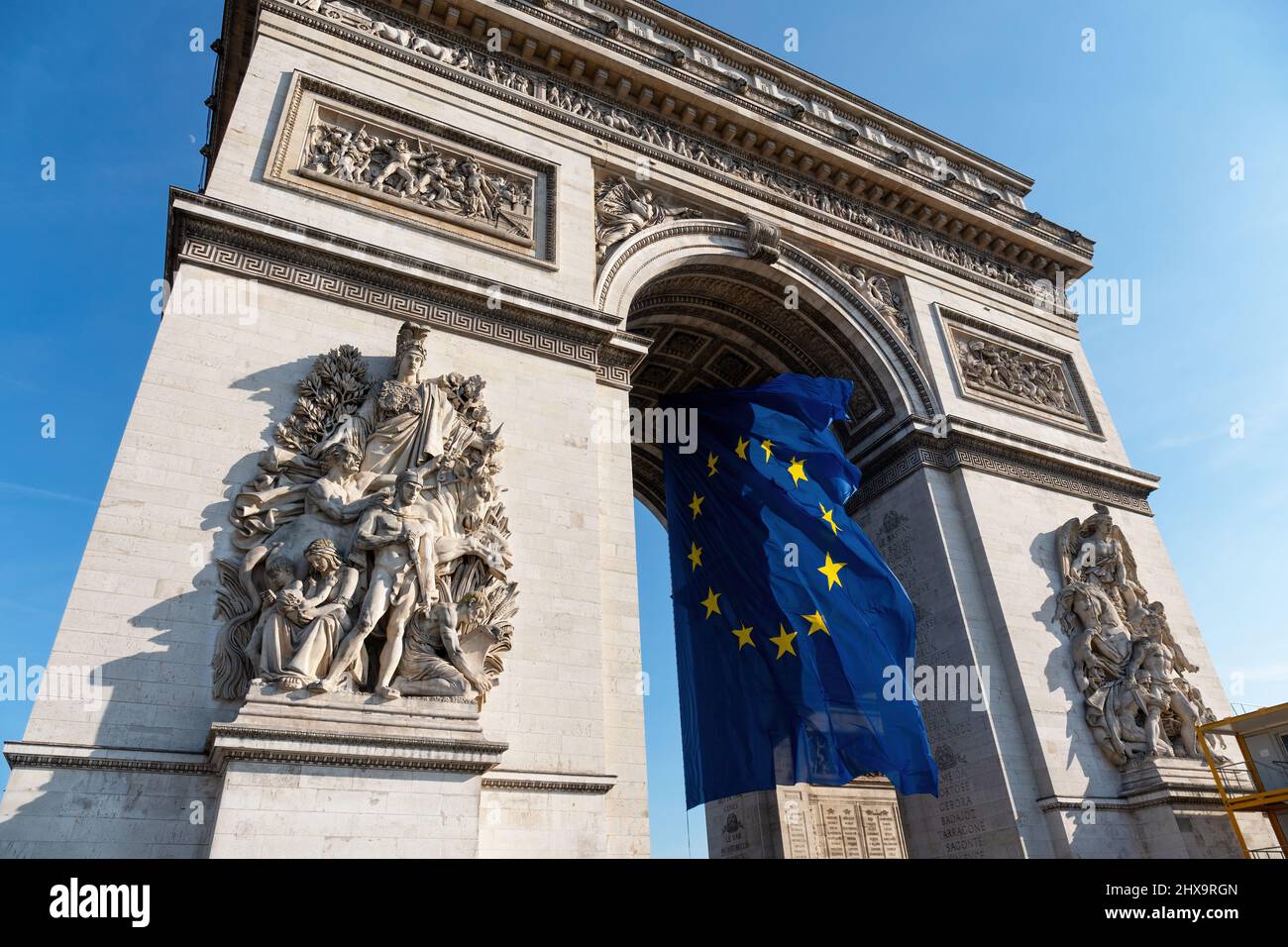 European Union flag flying in the wind under the Arc de Triomphe - Paris, France Stock Photo