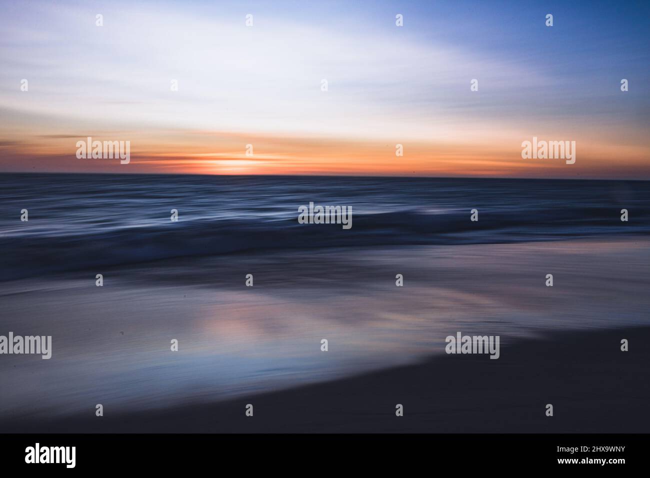 North Coogee Beach at Sunset; intentional camera movement, blur, Stock Photo