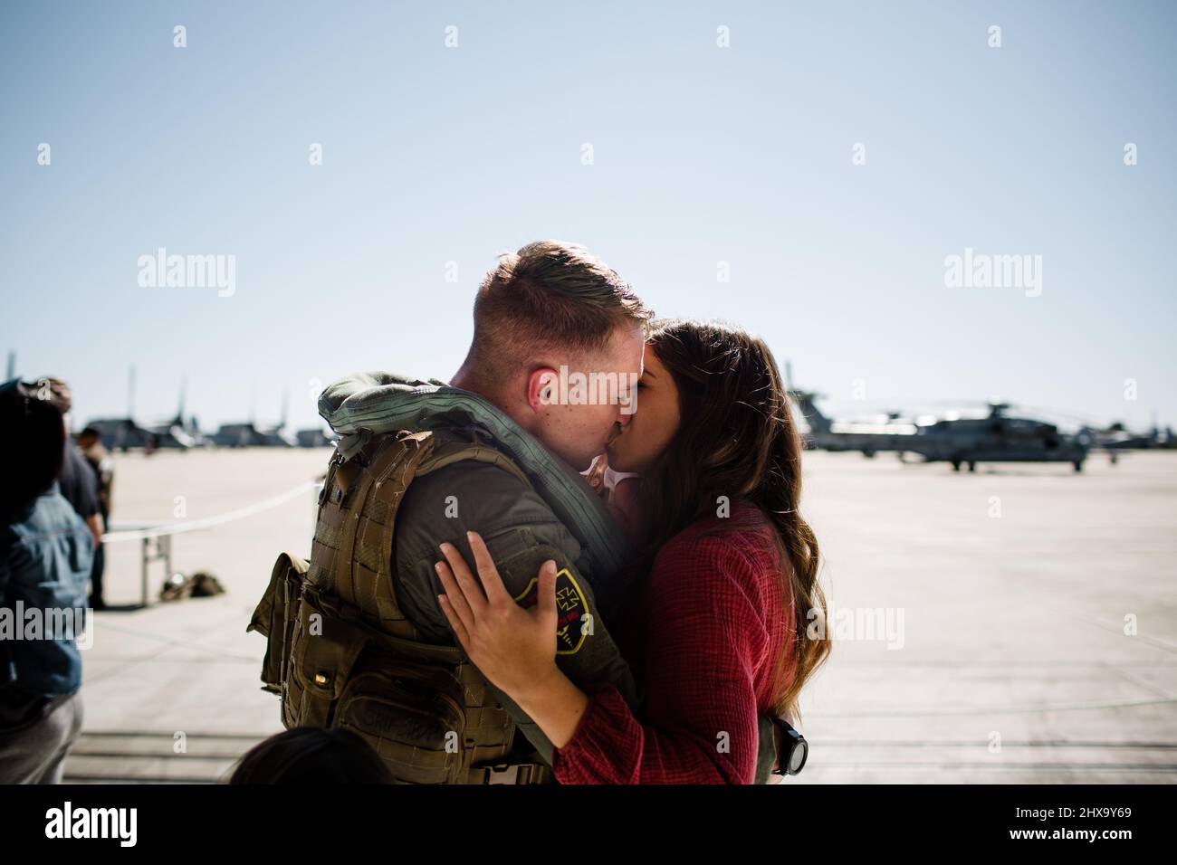 Husband & Wife Reuniting on Military Base in San Diego Stock Photo