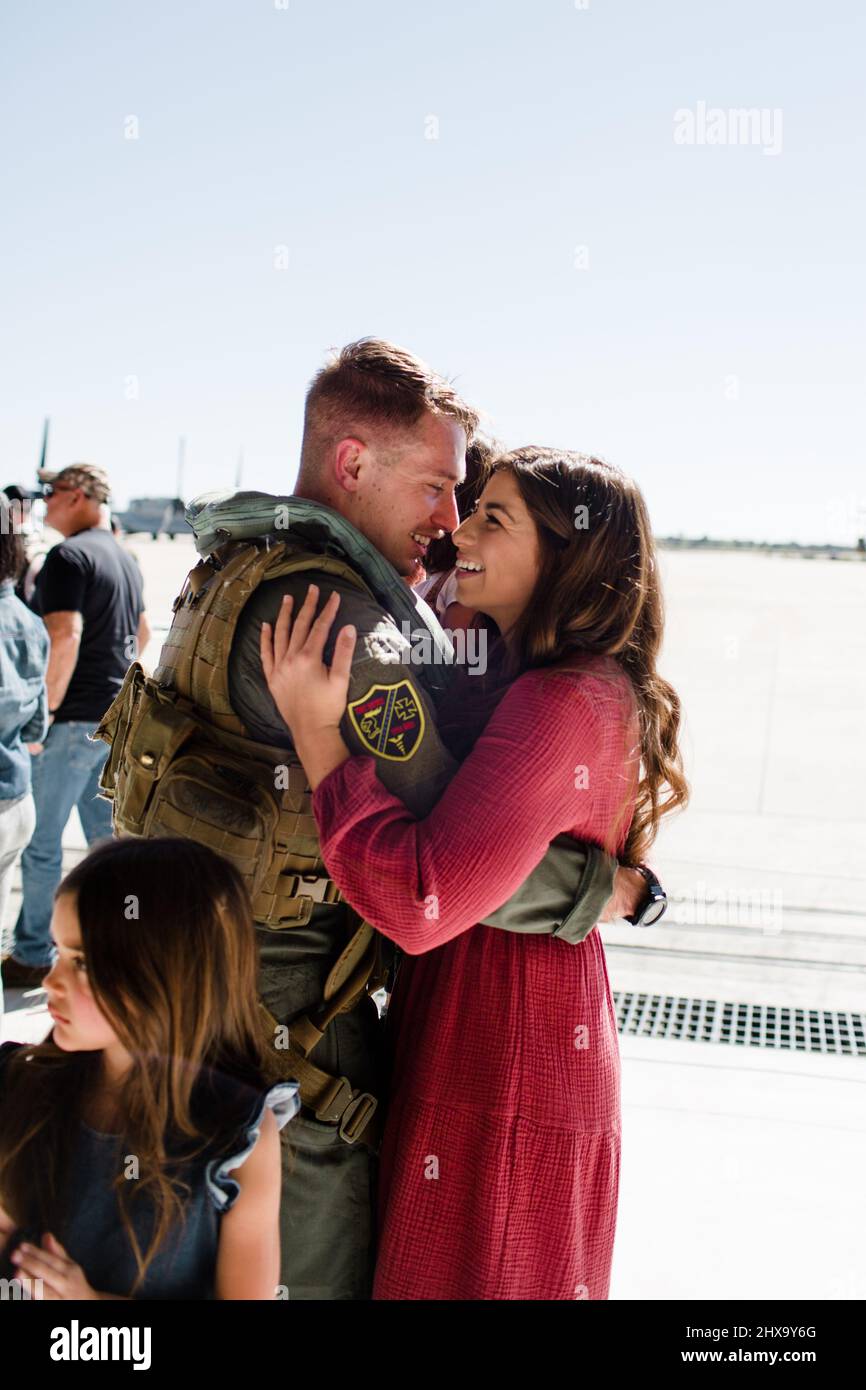 Husband Greeting Wife at Military Homecoming in San Diego Stock Photo