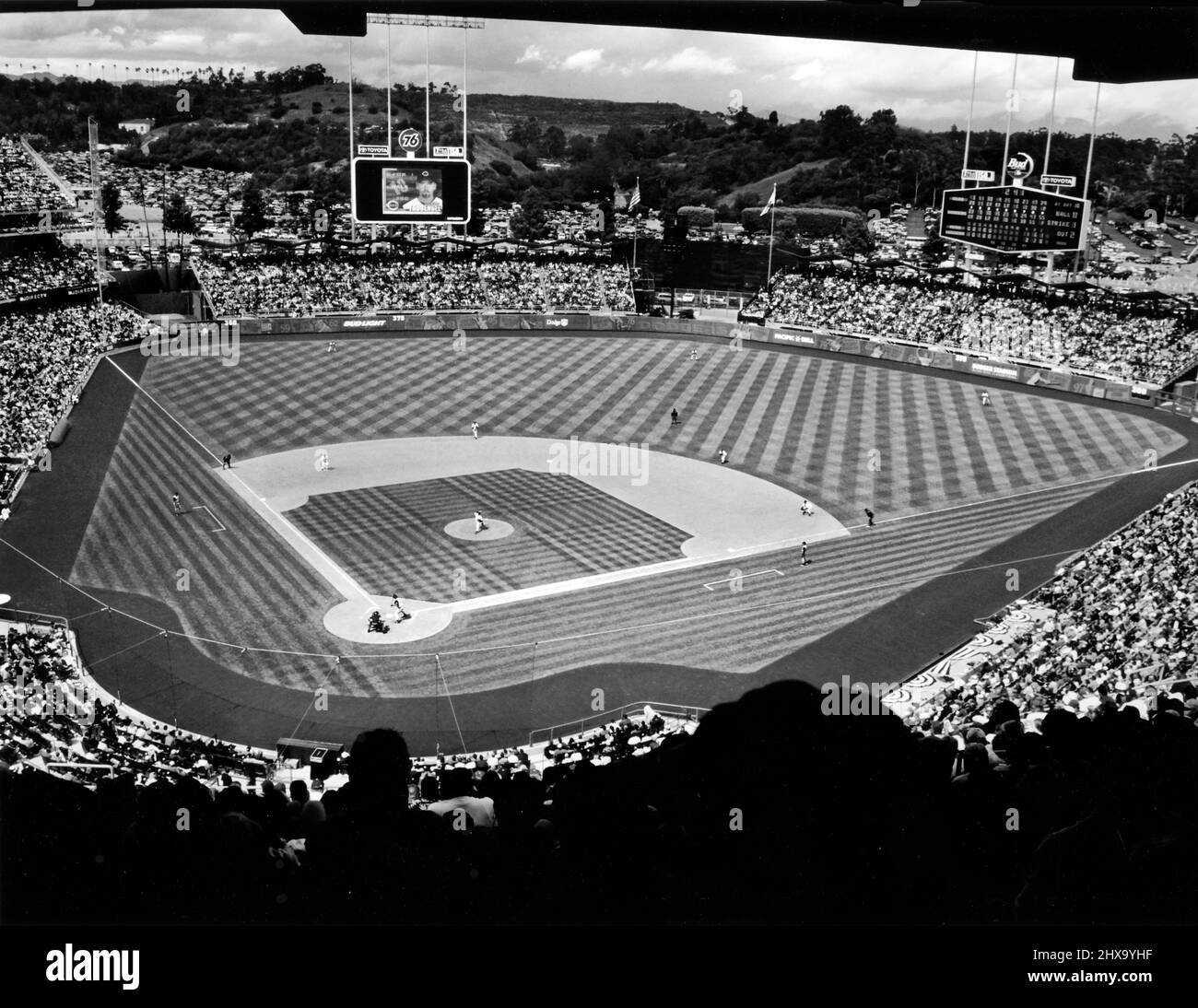 Sold out crowd at day baseball game at Dodger Stadium in Los Angeles, CA circa 1980s. Stock Photo