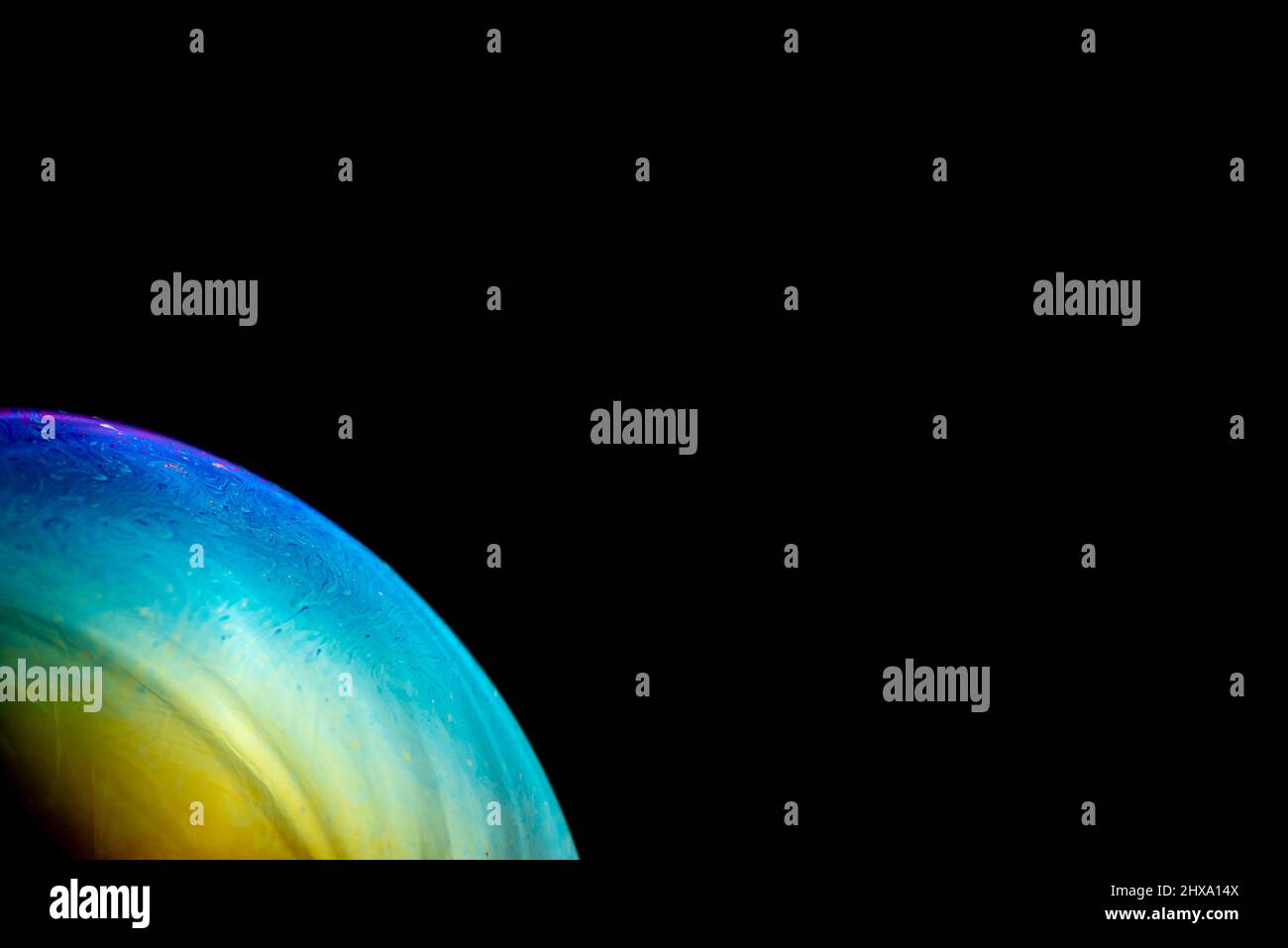 bubble with the appearance gaseous atmosphere of a planet with a multi-coloured Stock Photo