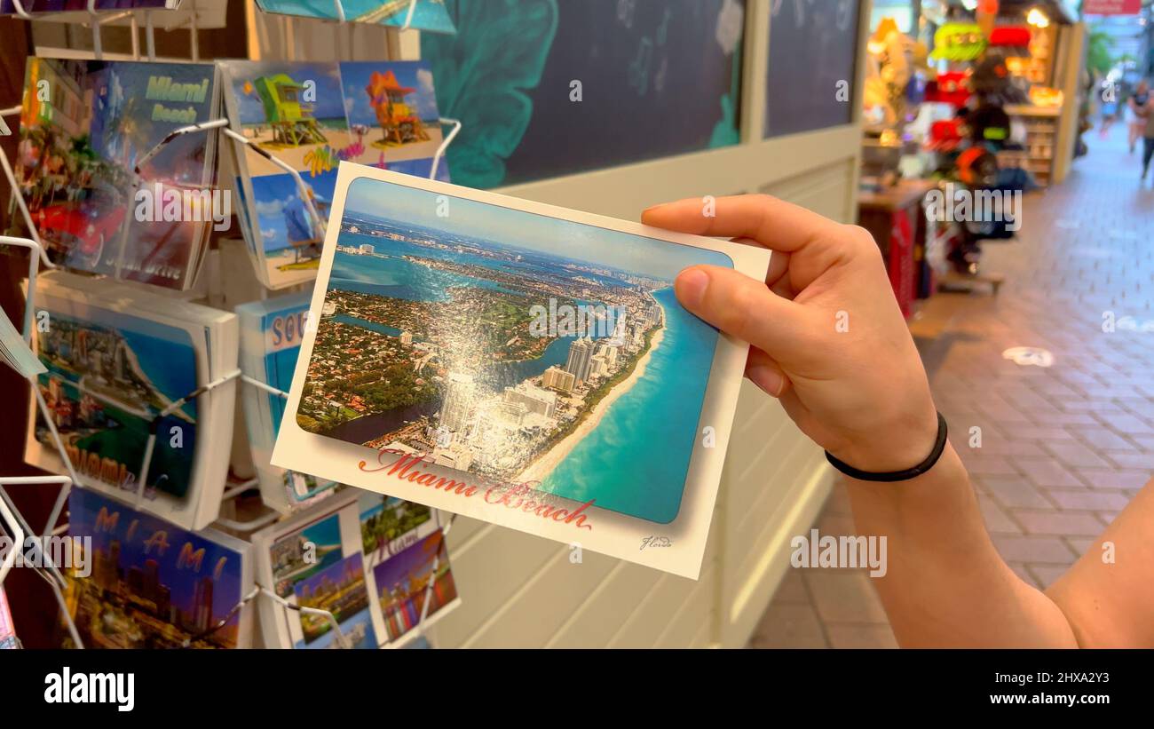 Looking for Miami Postcards at Bayside Marketplace Miami - MIAMI, UNITED STATES - FEBRUARY 20, 2022 Stock Photo