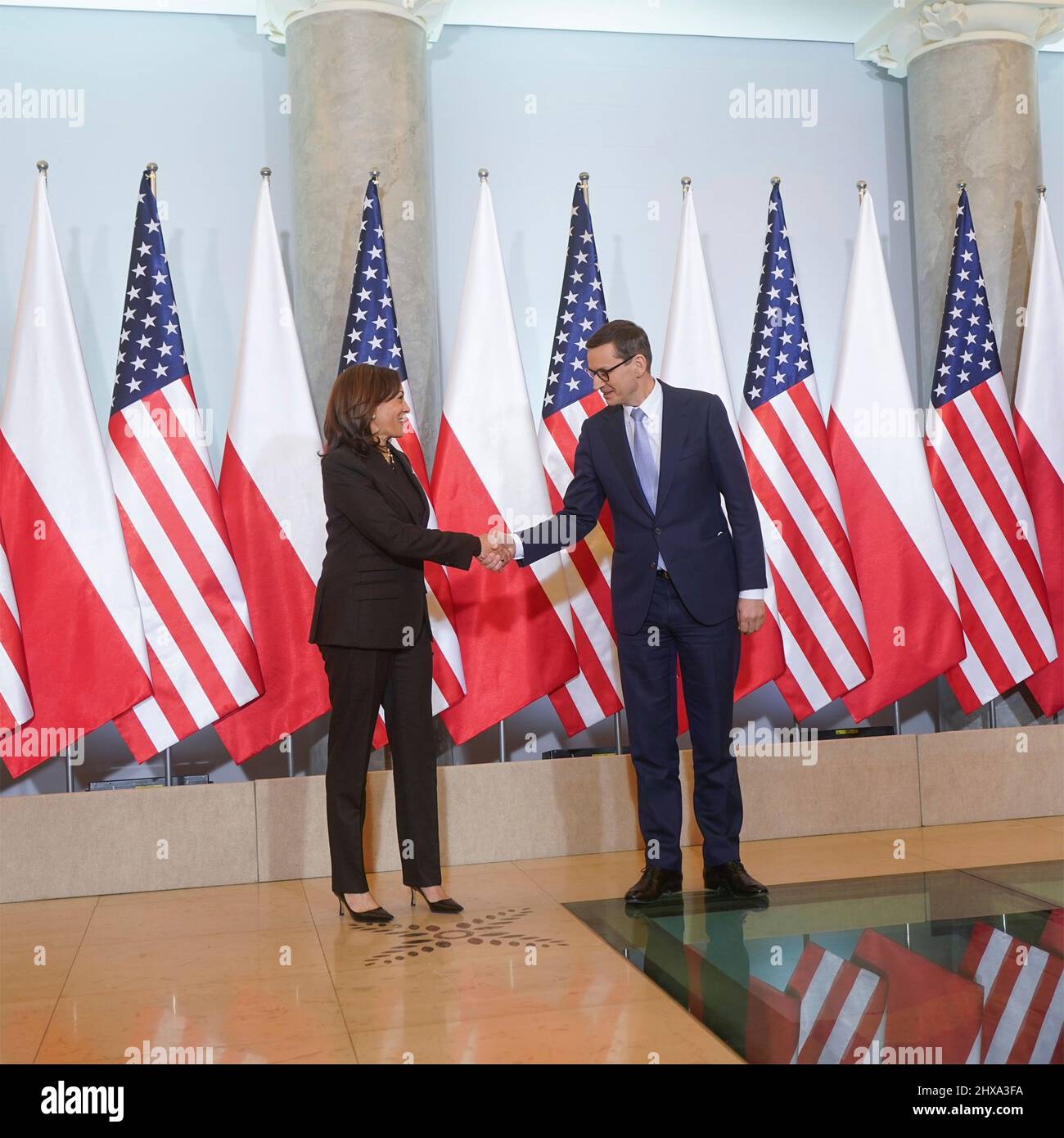 Warsaw, Poland. 10th Mar, 2022. U.S Vice President Kamala Harris, shakes hands with Polish President Andrzej Duda, right, before bilateral talks at Belwelder Palace, March 10, 2022 in Warsaw, Poland. Harris is in Poland to discuss the Ukraine crisis with NATO allies. Credit: Lawrence Jackson/White House Photo/Alamy Live News Stock Photo