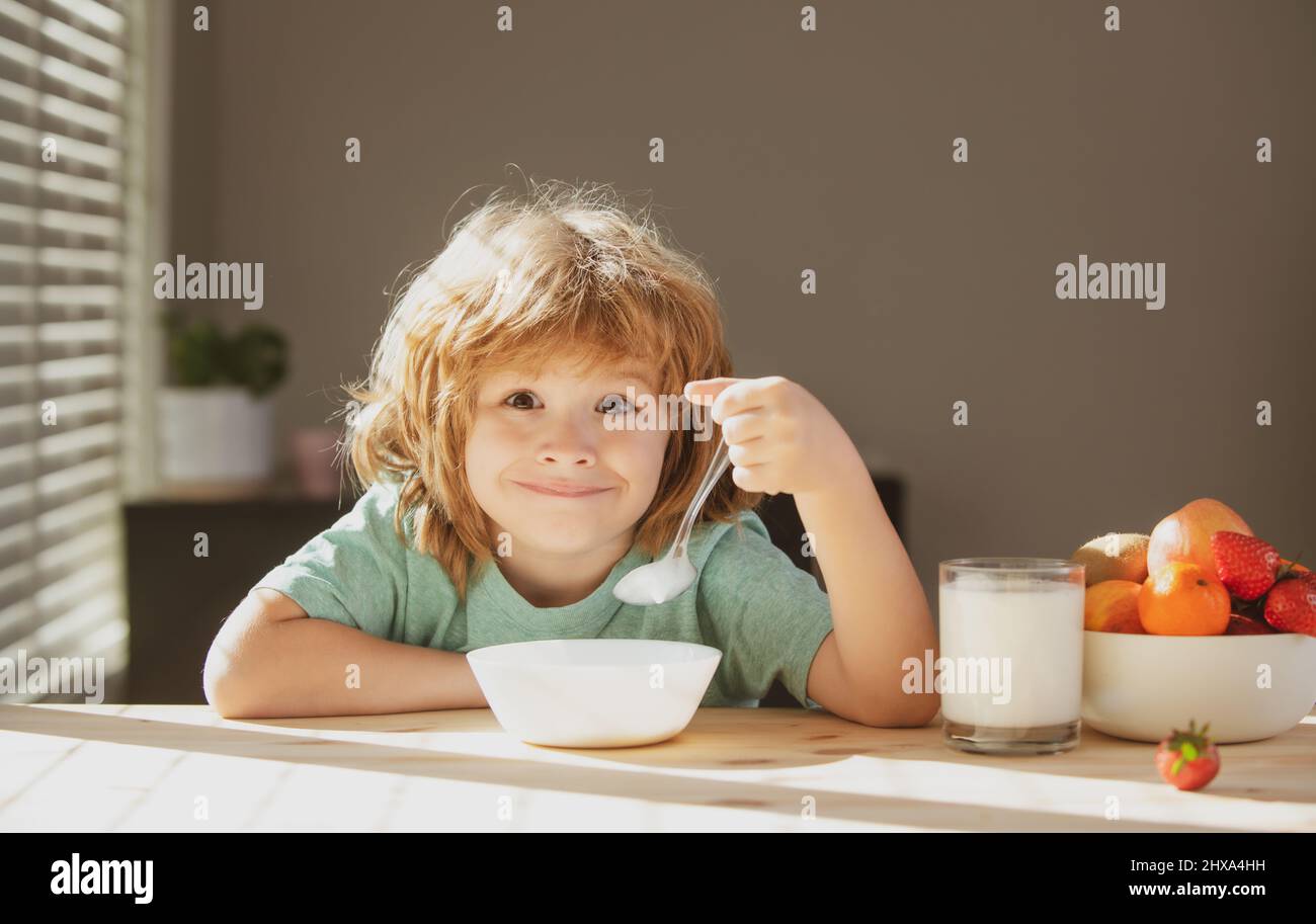 Child eating healthy food. Cute little boy having soup for lunch Stock Photo Alamy