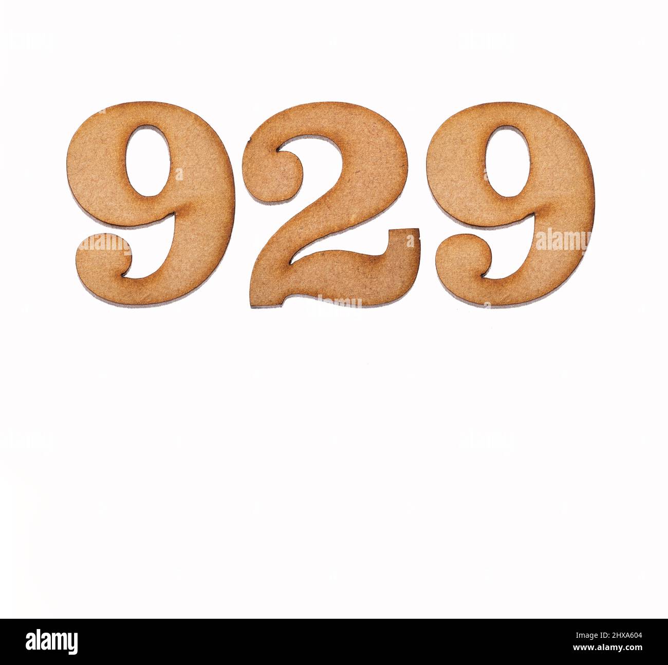 Number 929 in wood, isolated on white background Stock Photo - Alamy