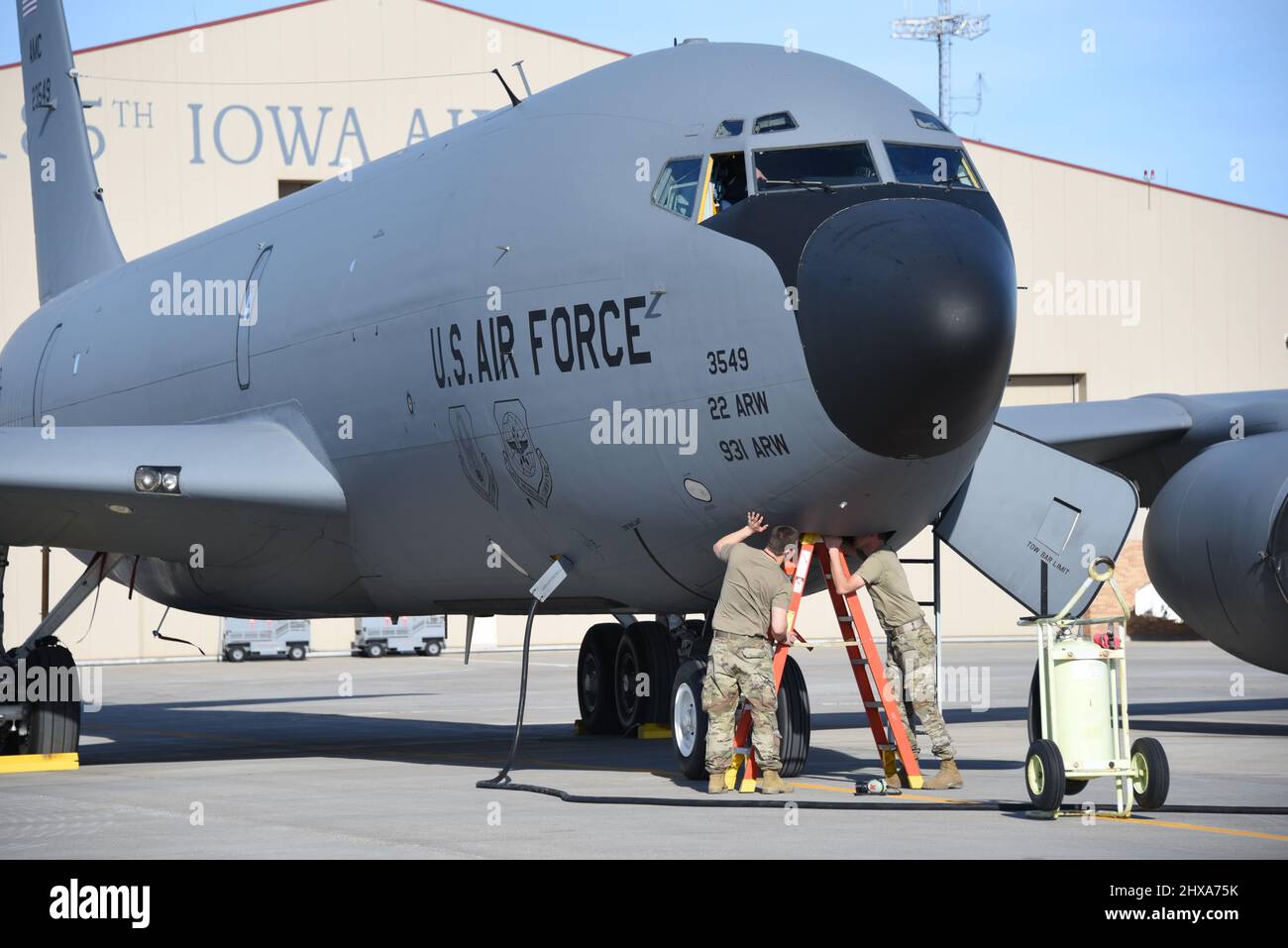 Crew chiefs from the Iowa Air National Guard recover a U.S. Air Force KC-135, tail number 62-3549 on the ramp in Sioux City, Iowa on March 1, 2022. The aircraft has just been transferred from McConnell Air Force Base to the Iowa National Guard. U.S. Air National Guard photo Senior Master Sgt. Vincent De Groot 185th ARW Wing PA Stock Photo