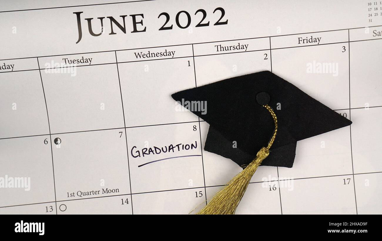 Graduation date marked on a calendar in June with graduation cap and tassel Stock Photo