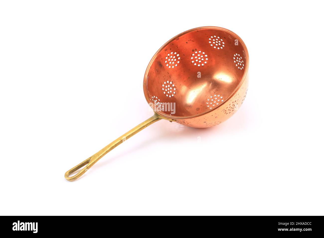 Vintage copper colander white Background Stock Photo - Alamy