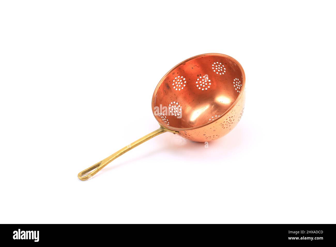 Vintage copper colander white Background Stock Photo