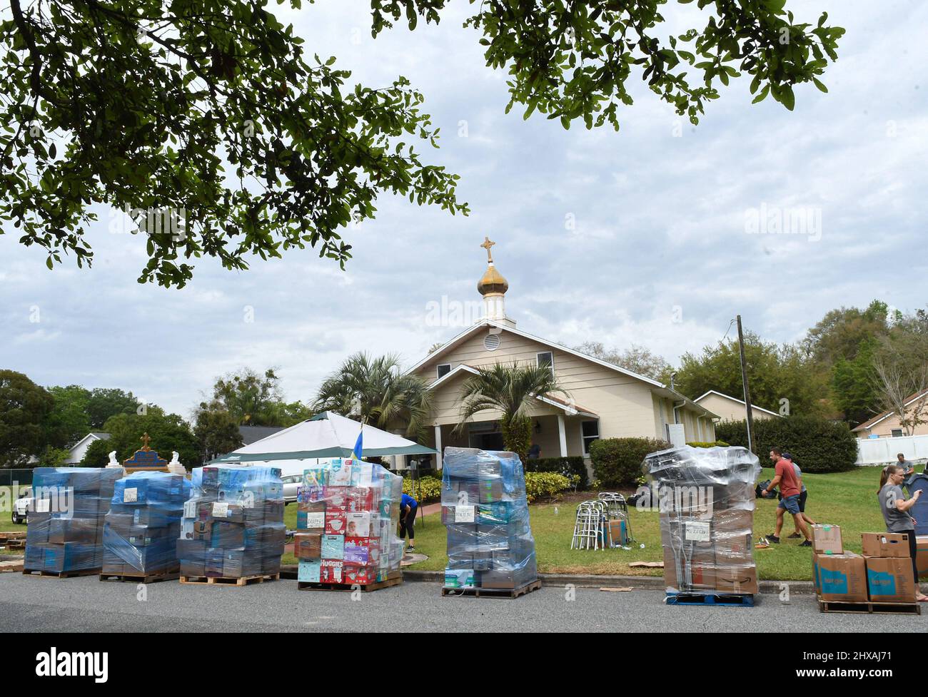 Apopka, United States. 10th Mar, 2022. Pallets of donated items for victims of the Russian invasion of Ukraine are seen outside St. Mary Protectress Ukrainian Catholic Church in Apopka, Florida near Orlando. The church is collecting donations of clothing, blankets, food, and medical supplies for displaced Ukrainians as the war enters its third week. (Photo by Paul Hennessy/SOPA Images/Sipa USA) Credit: Sipa USA/Alamy Live News Stock Photo