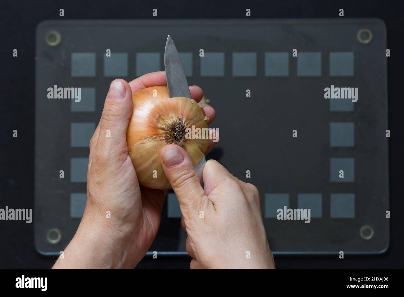 Cutting onion hi-res stock photography and images - Alamy