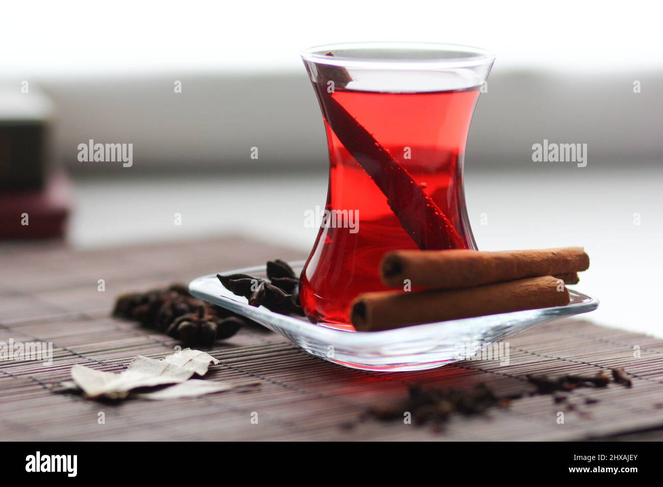 Ruby carcade tea with cinnamon stick, cloves, badyan and bay leaves